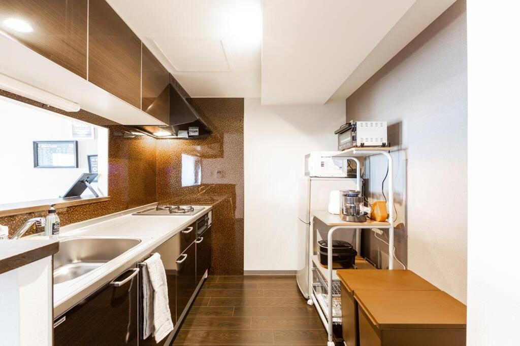 Two-Bedroom Apartment - Photo 24