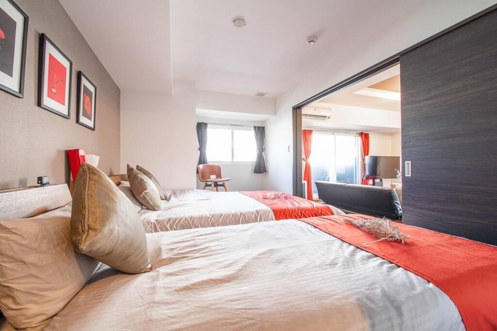 Three-Bedroom Apartment - Photo 26