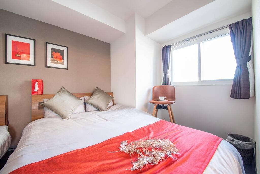 Three-Bedroom Apartment - Photo 25