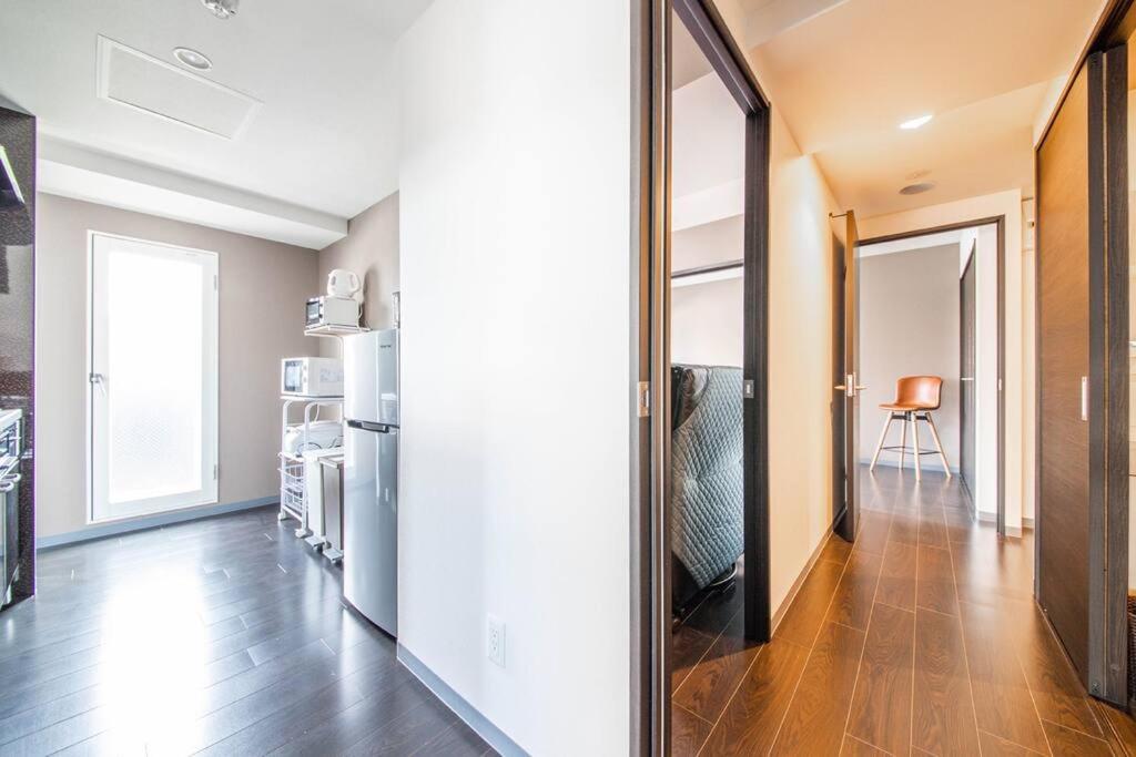 Three-Bedroom Apartment - Photo 23