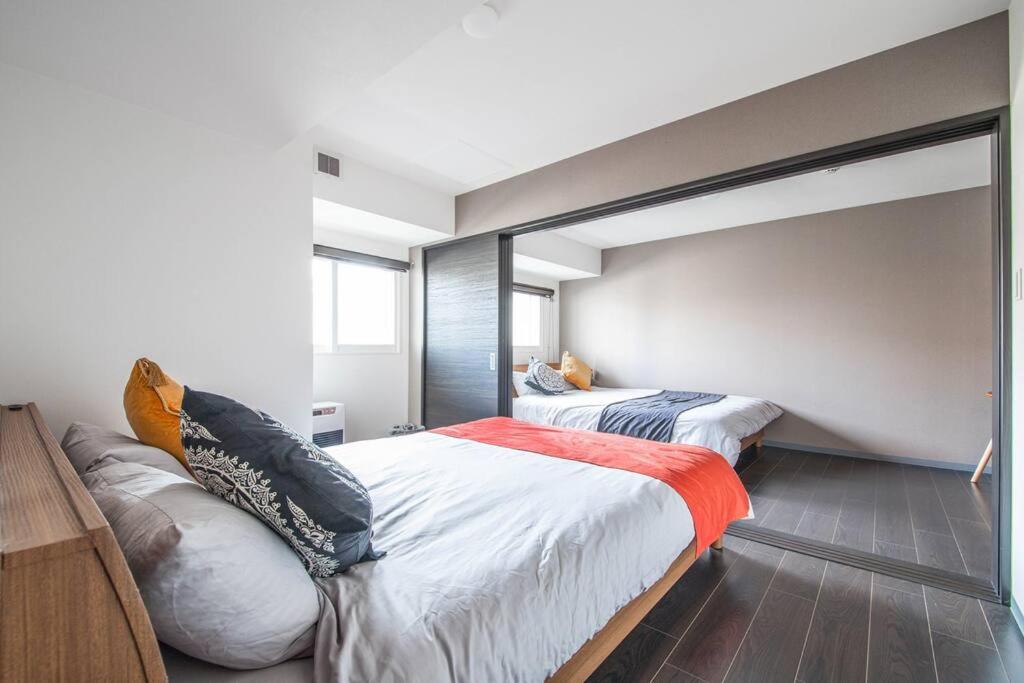 Three-Bedroom Apartment - Photo 21