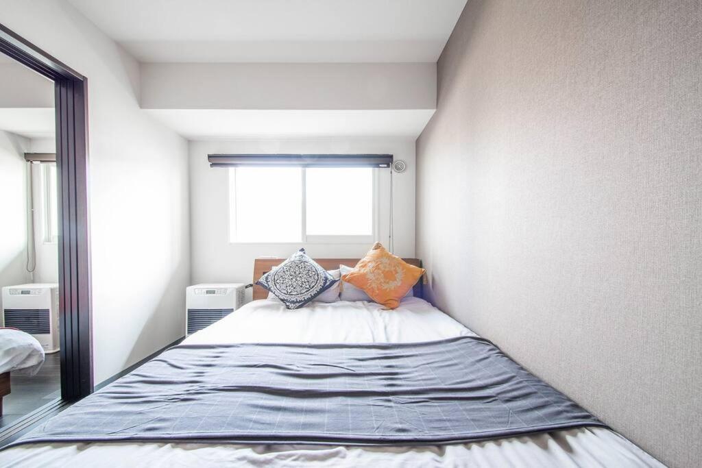 Three-Bedroom Apartment - Photo 17