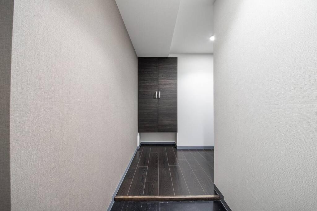 Three-Bedroom Apartment - Photo 13