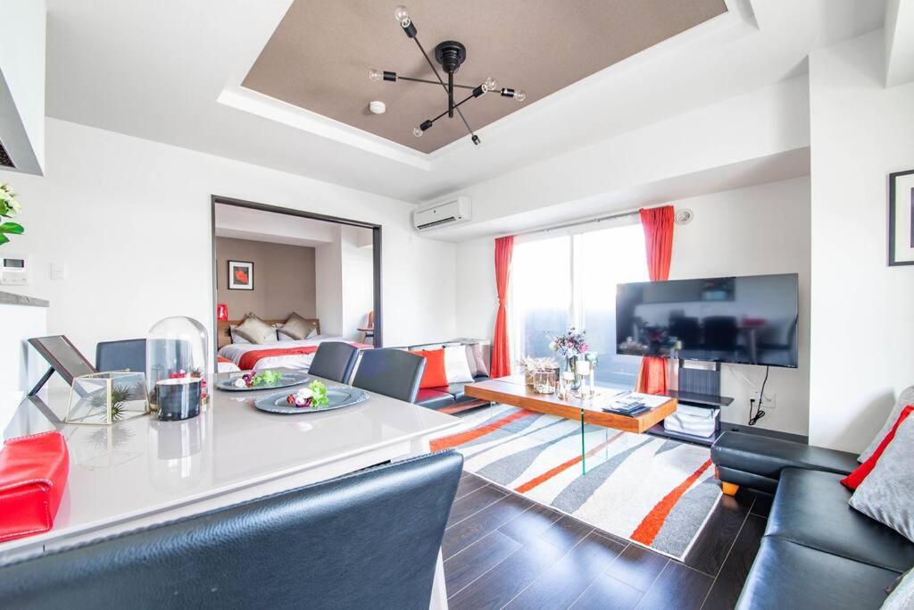 Three-Bedroom Apartment - Photo 10