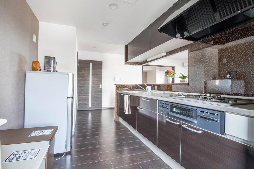 Three-Bedroom Apartment - Photo 7