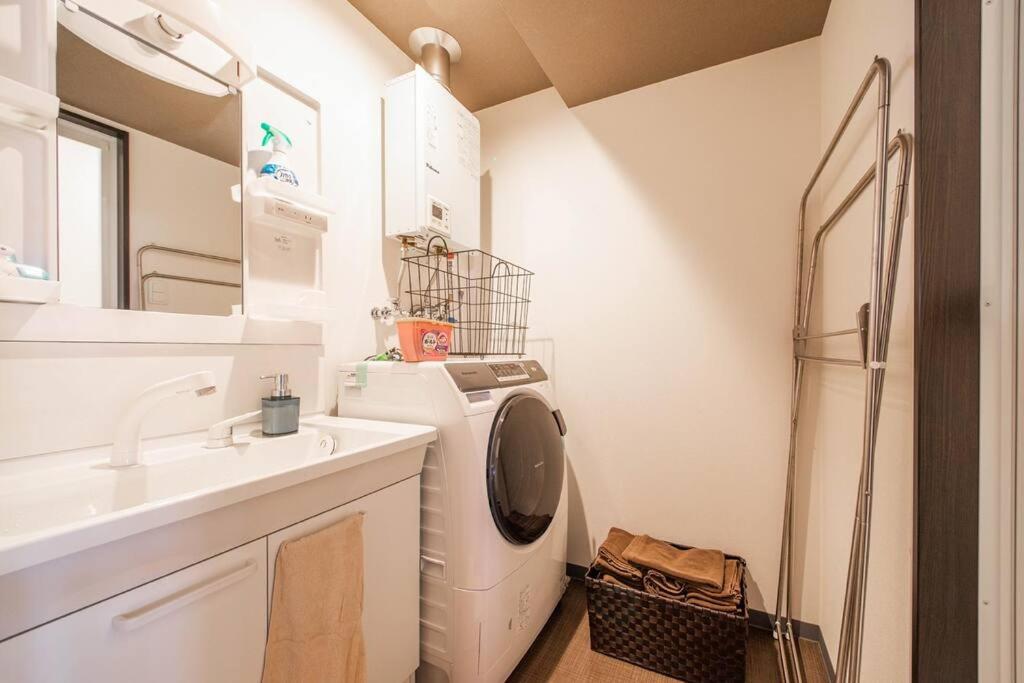 Three-Bedroom Apartment - Photo 6