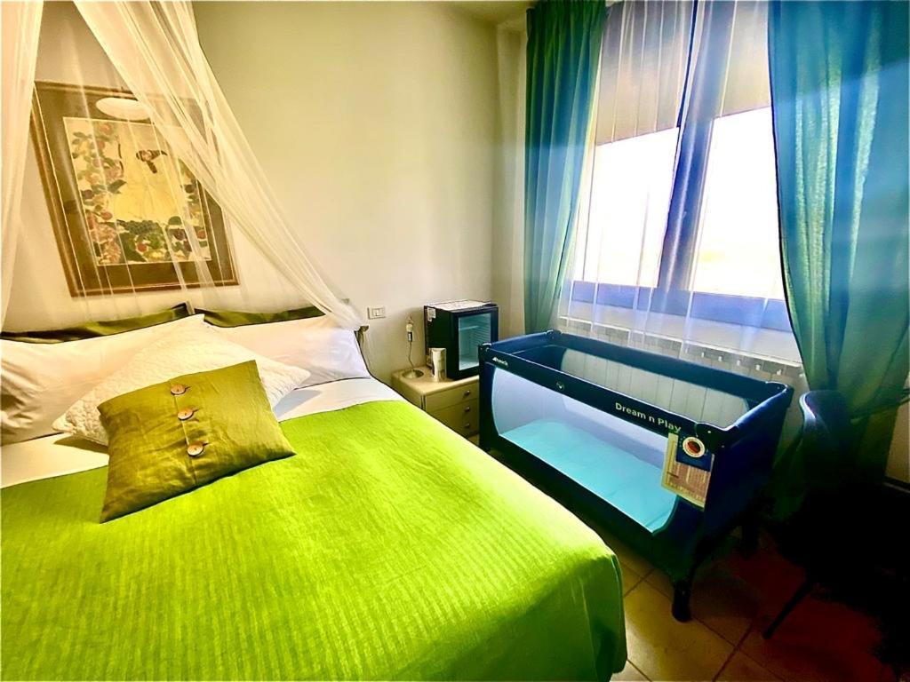 Deluxe Quadruple Room - Photo 23