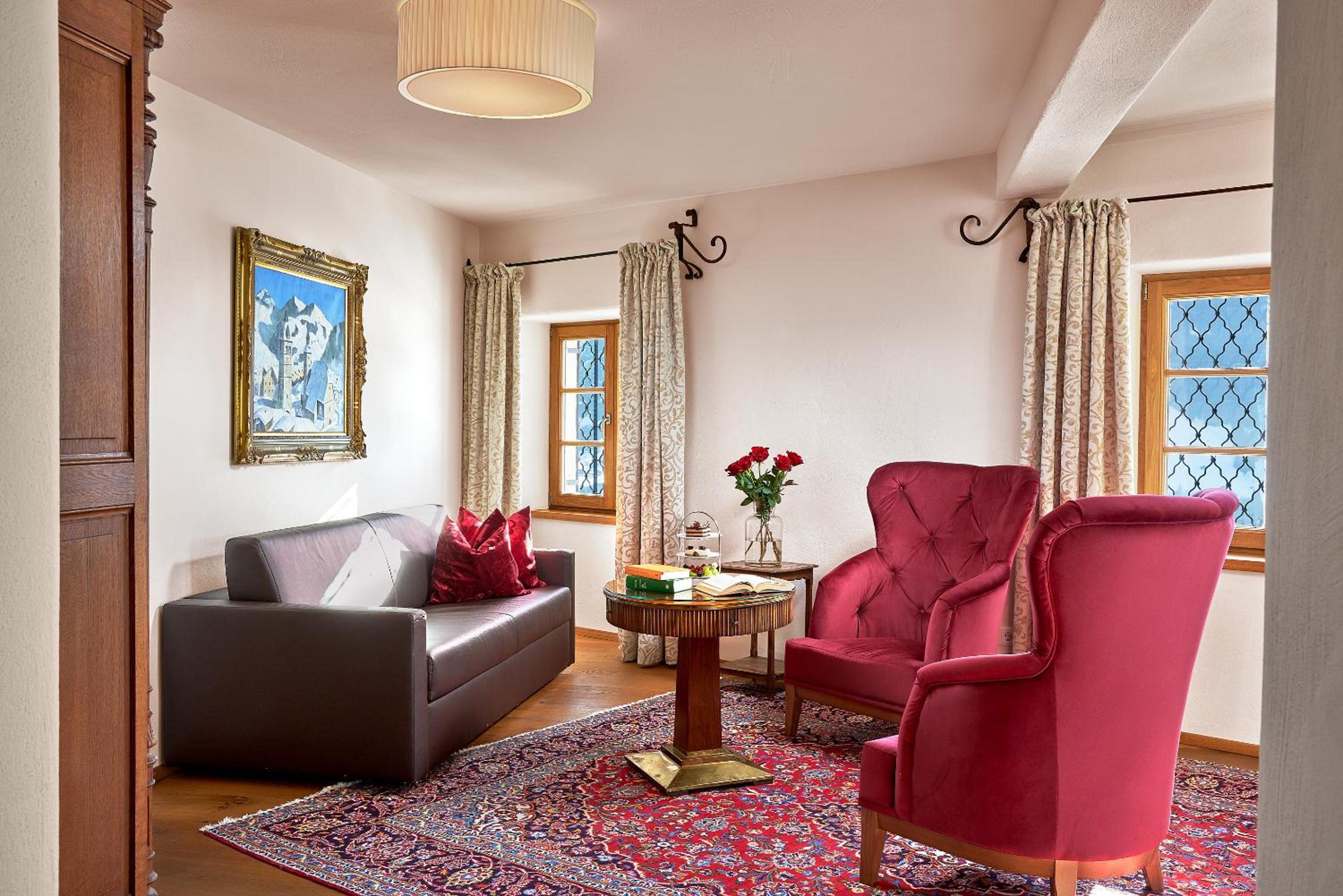 King Suite with Balcony - Photo 2