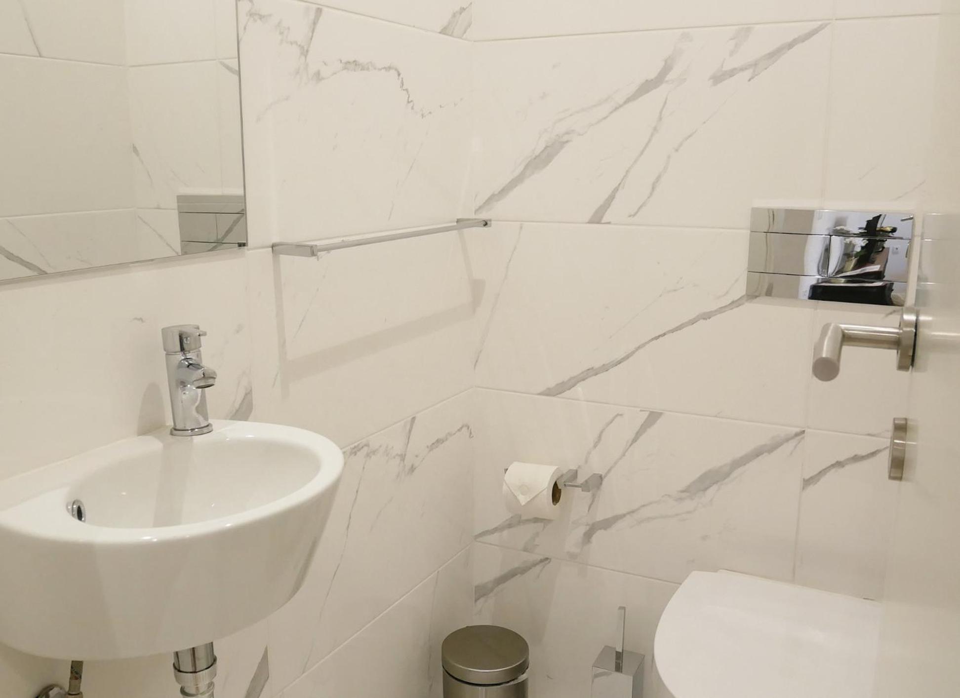 Three-Bedroom Apartment - Photo 15