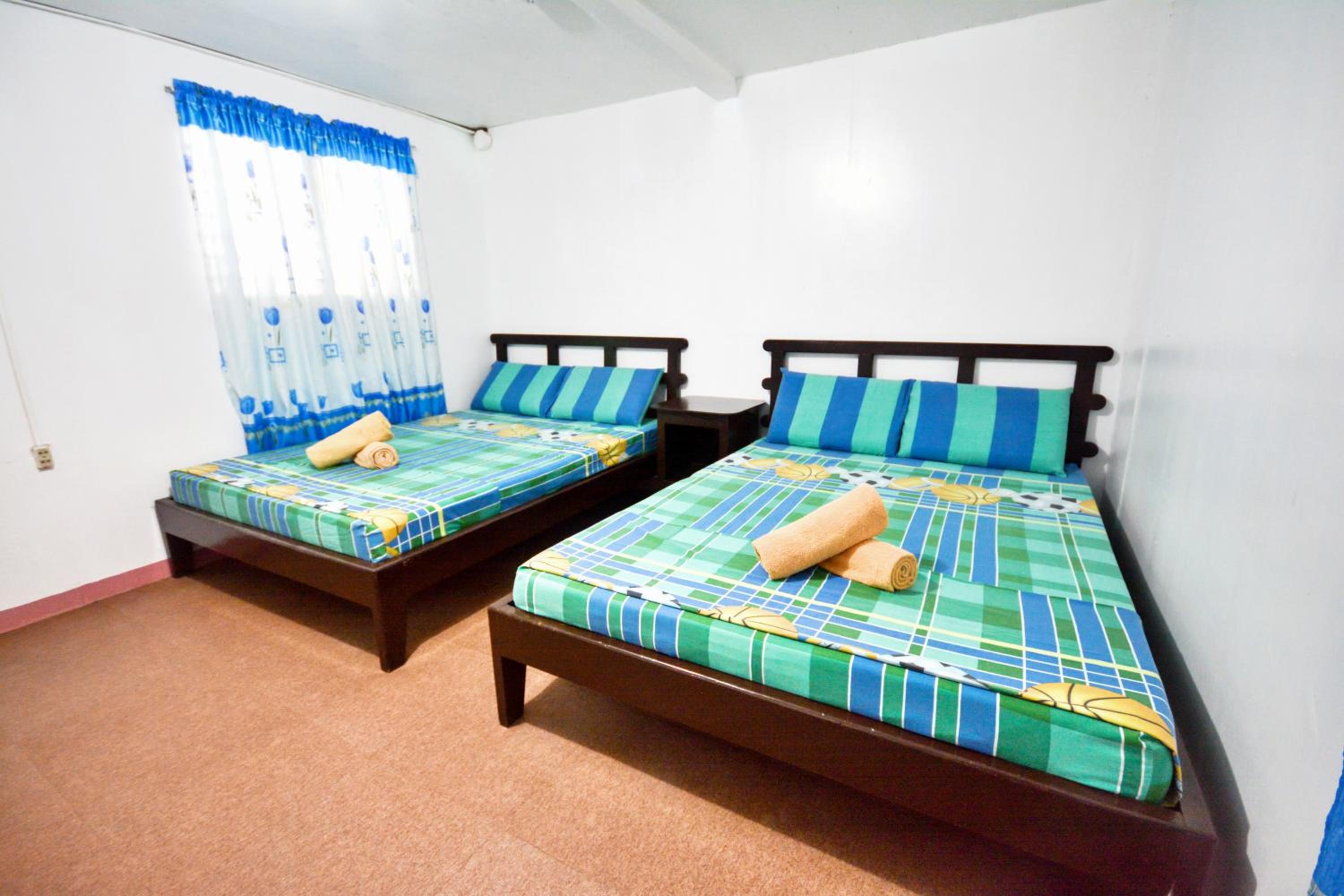 Deluxe Room with Fan (no TV) - Photo 1