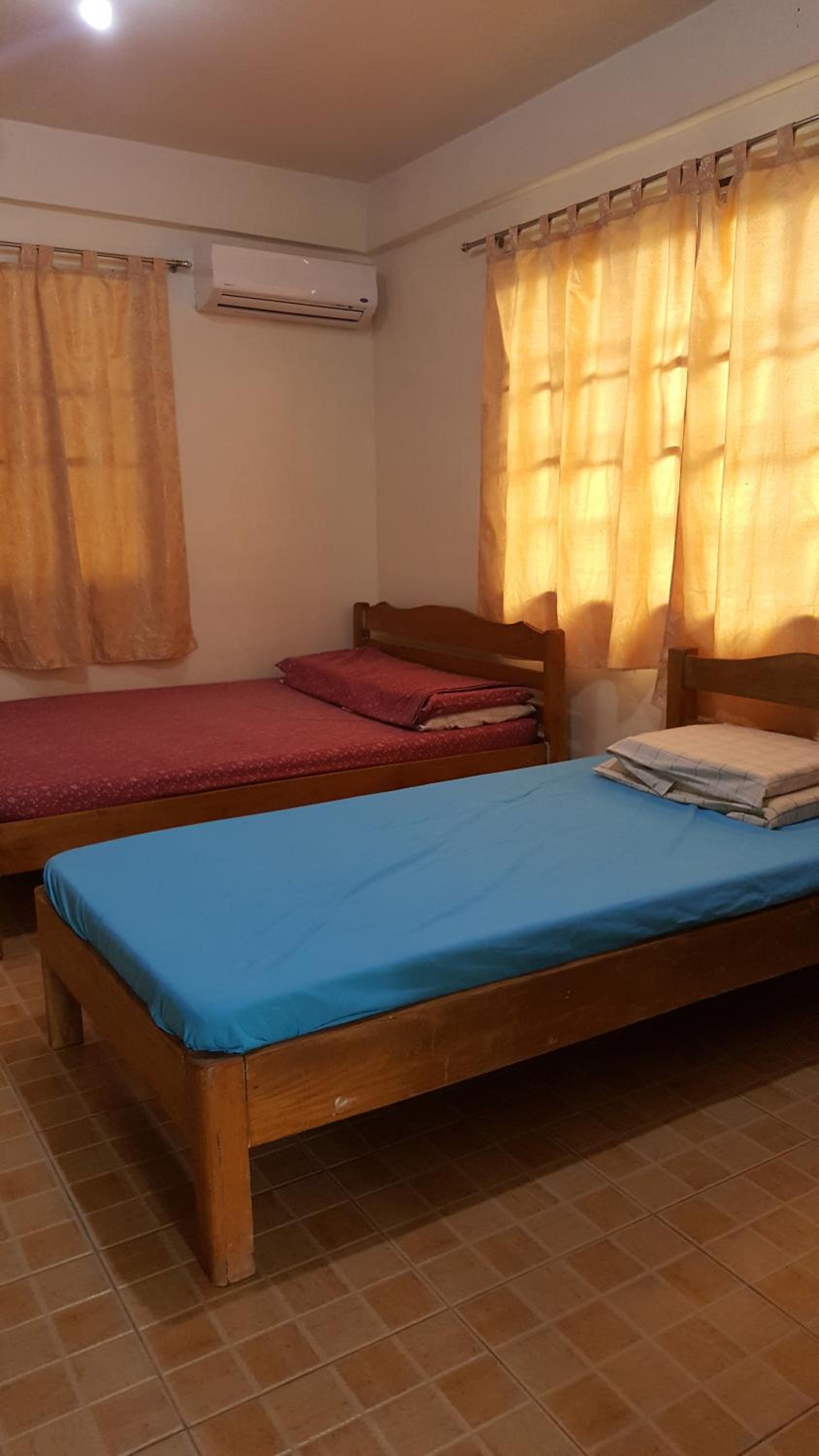 Economy Triple Room photo 2