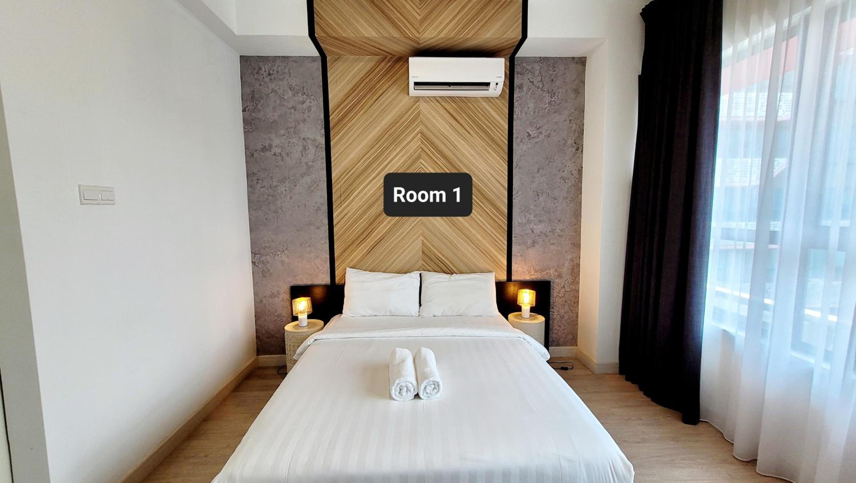 Three-Bedroom Apartment - Photo 10