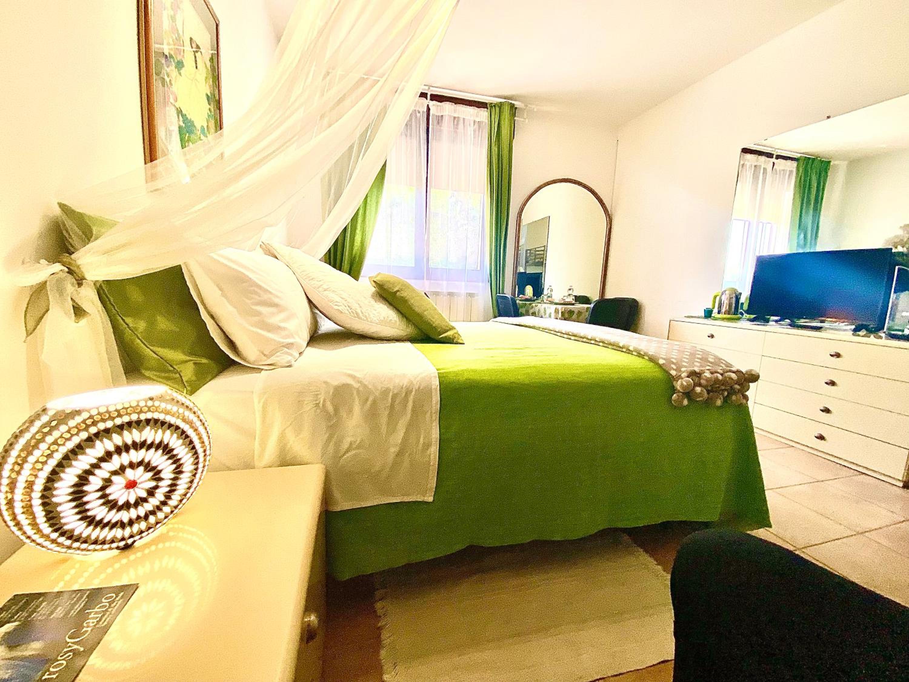 Deluxe Quadruple Room - Photo 19