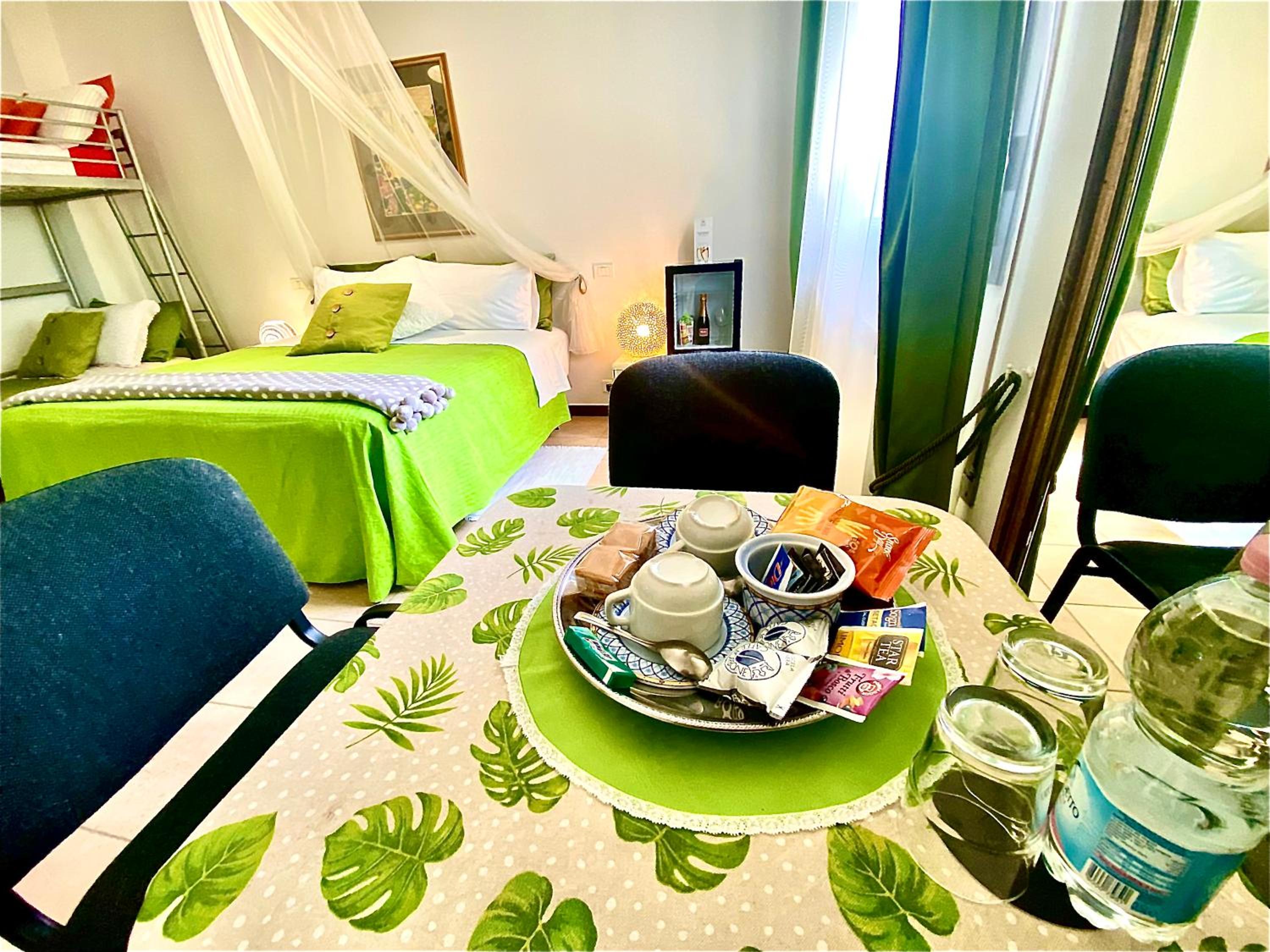 Deluxe Quadruple Room - Photo 21