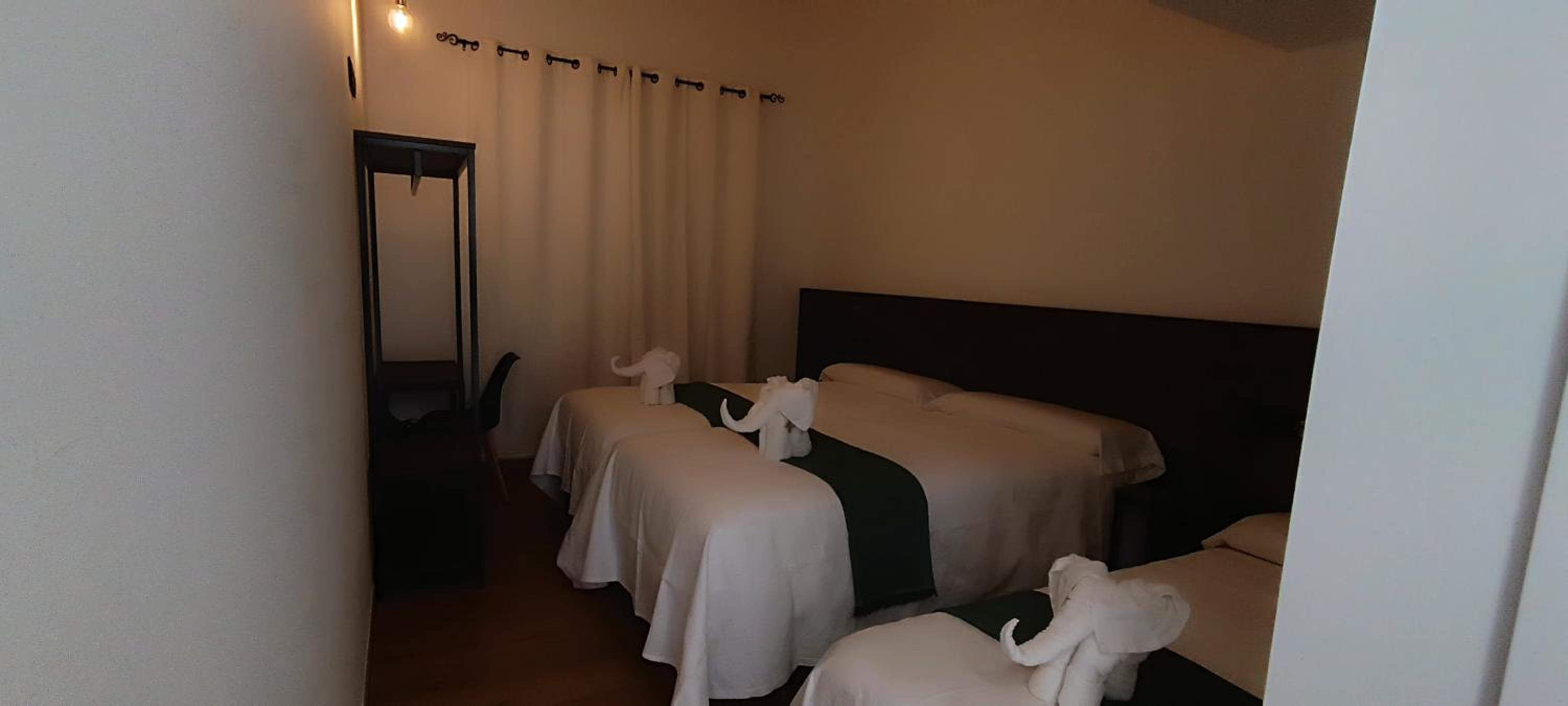 Habitación triple con baño