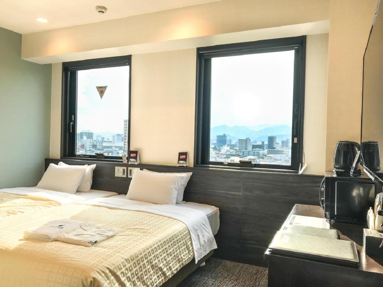 Twin Room - Non-Smoking - Photo 1