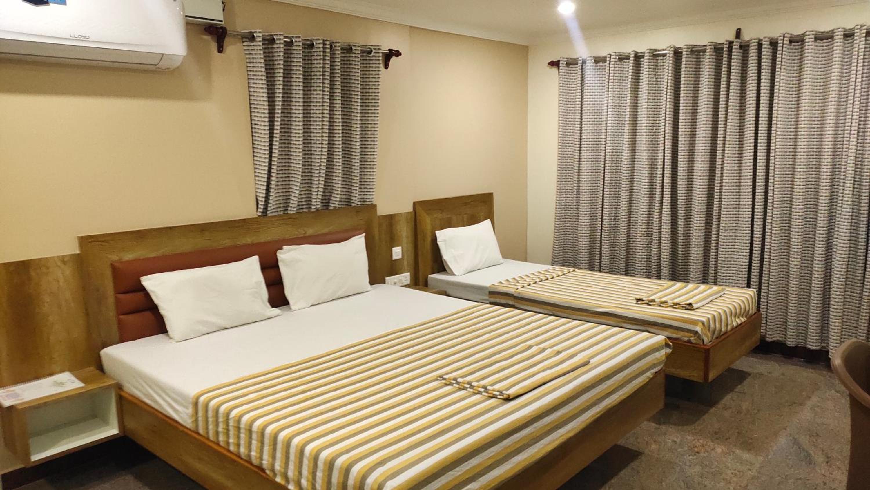 Deluxe Triple Room - Photo 8
