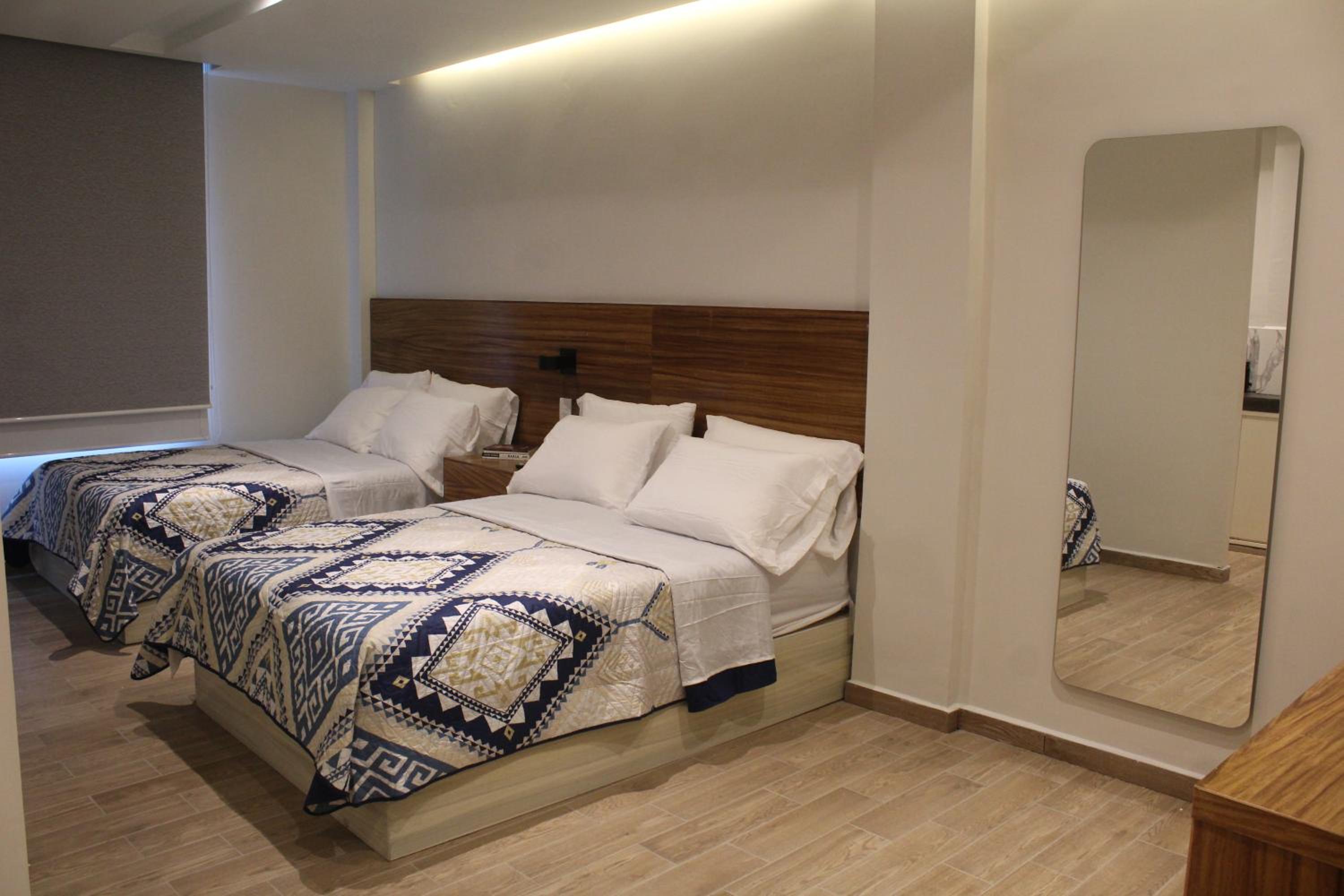 Deluxe Double Room with Two Double Beds - Photo 19