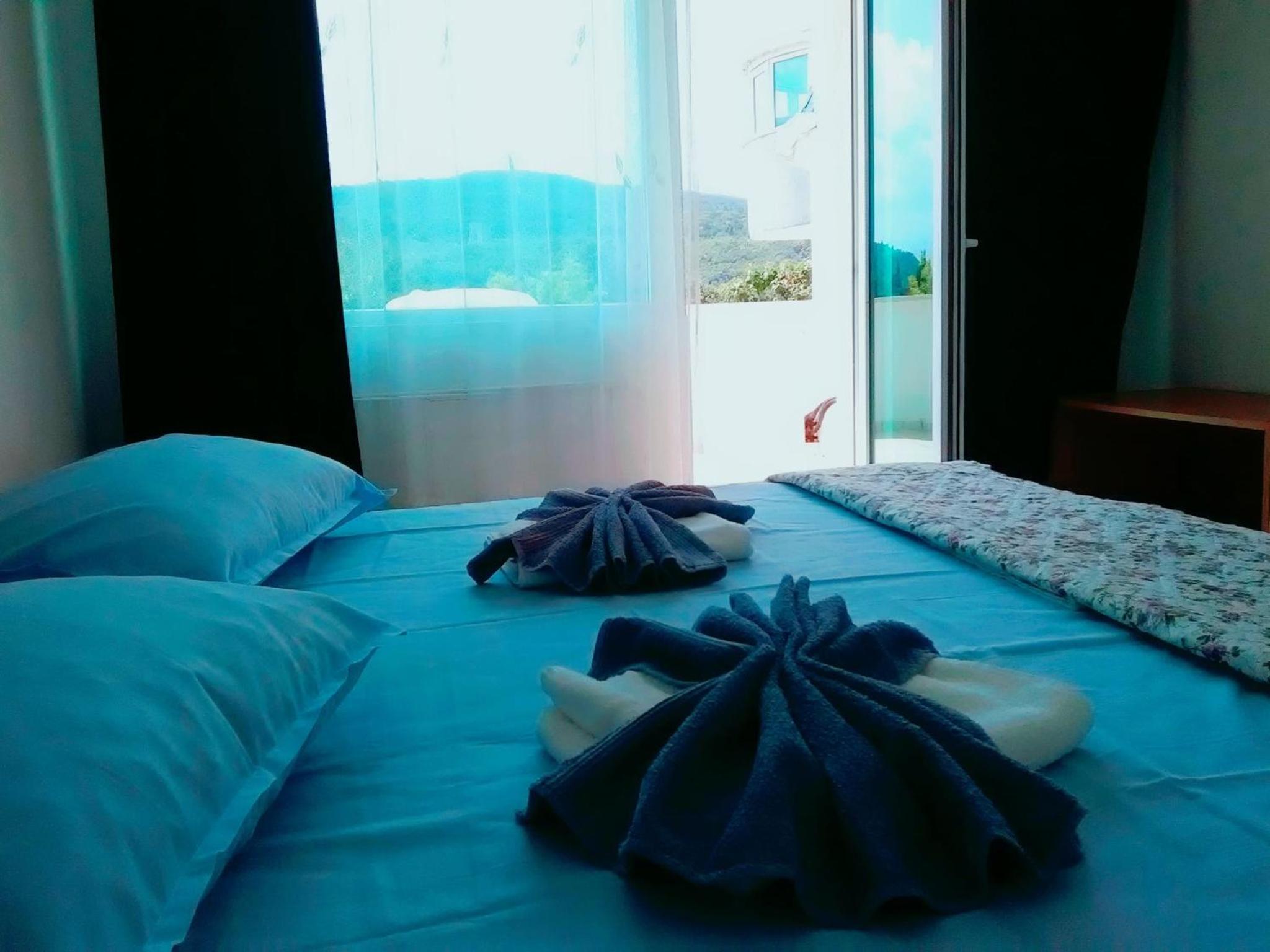 Quadruple Room with Balcony - Photo 2