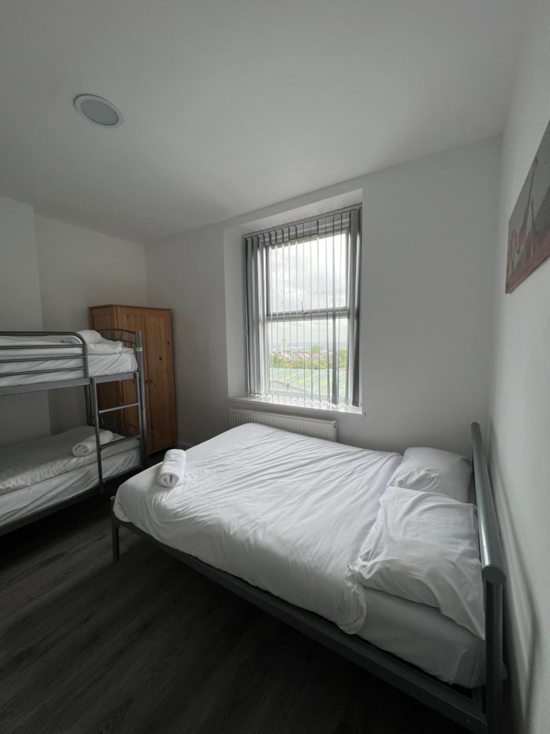 Three-Bedroom Apartment - Photo 9