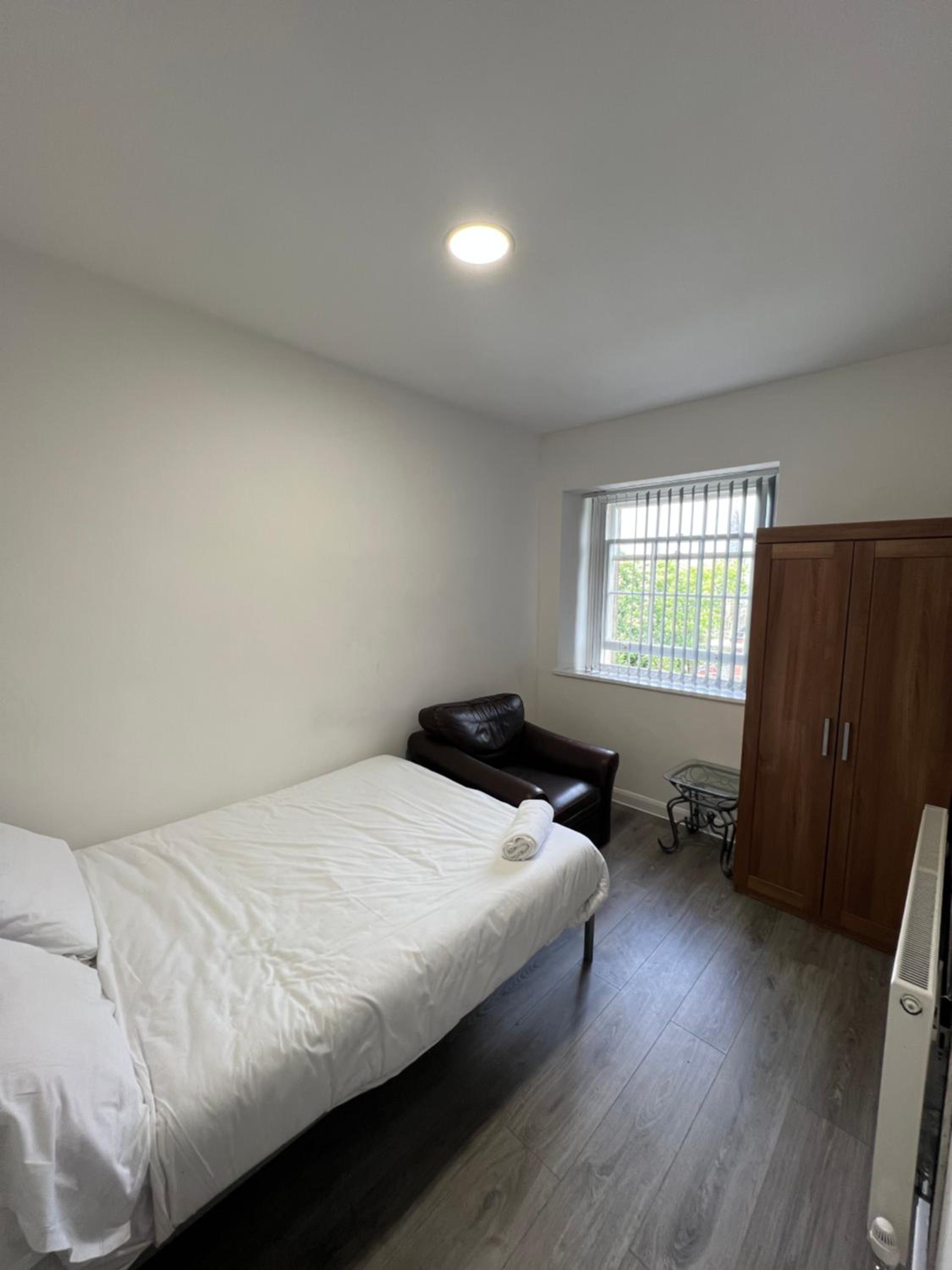Three-Bedroom Apartment - Photo 6