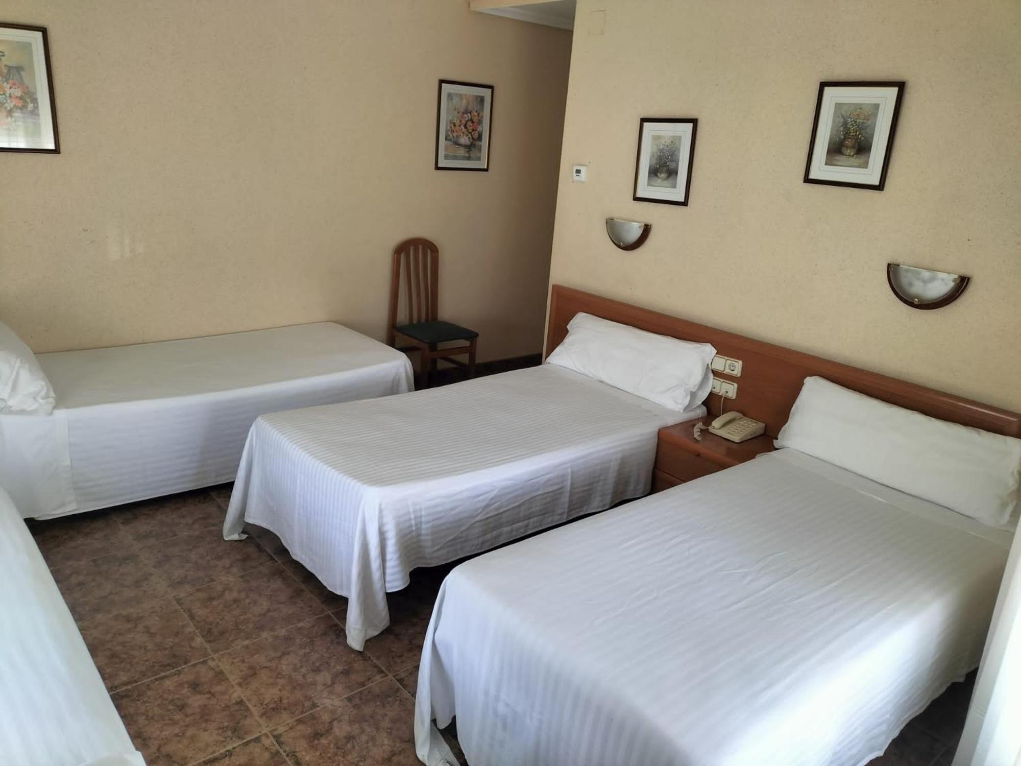 Habitación Triple con Balcón