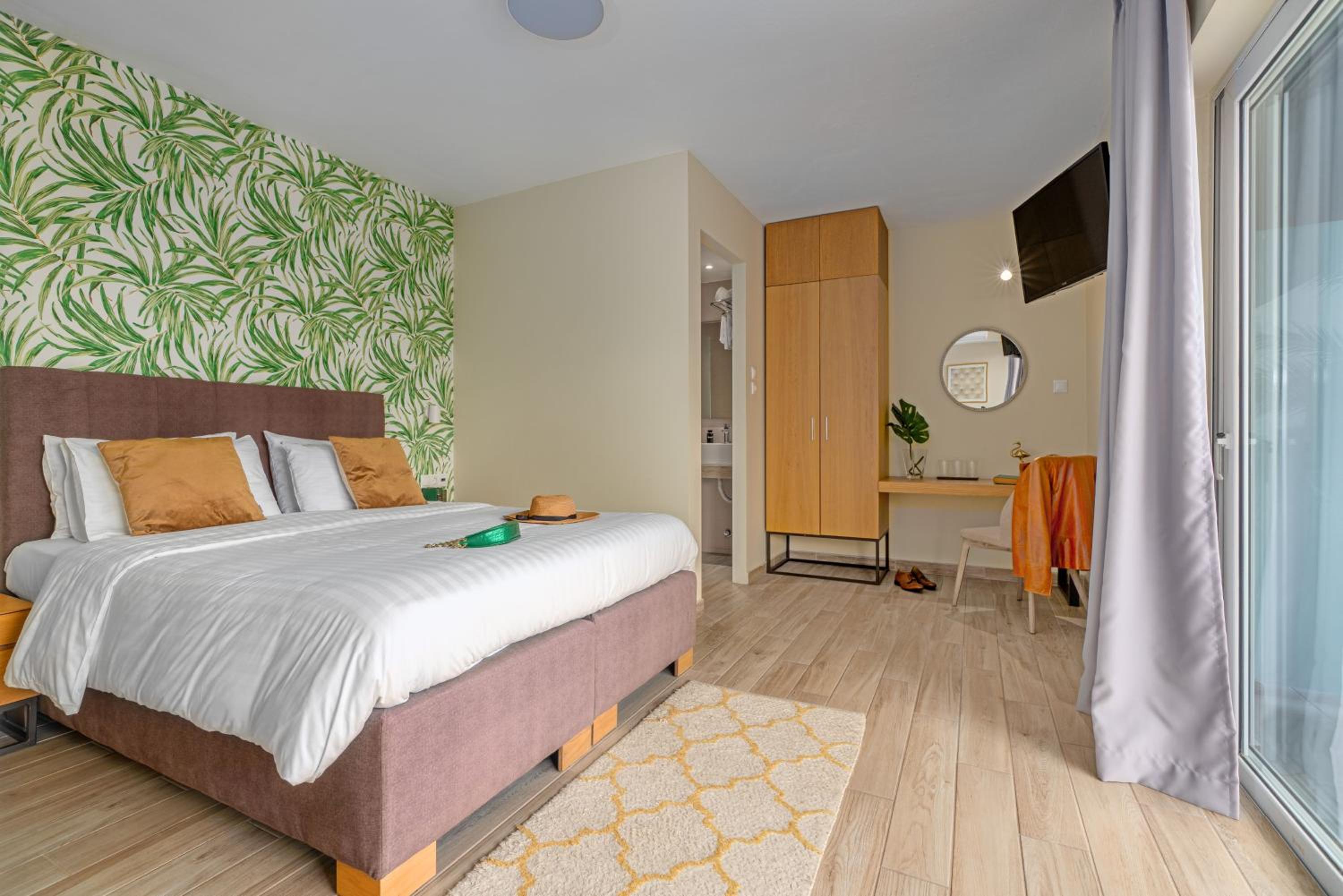 King Suite with Balcony & Side Sea View