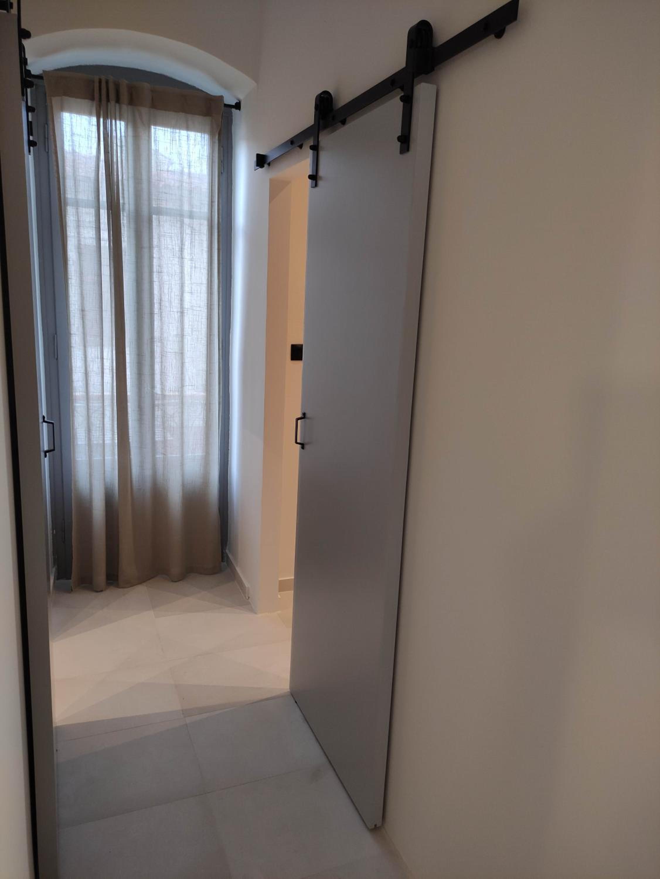 Two-Bedroom Apartment - Photo 38