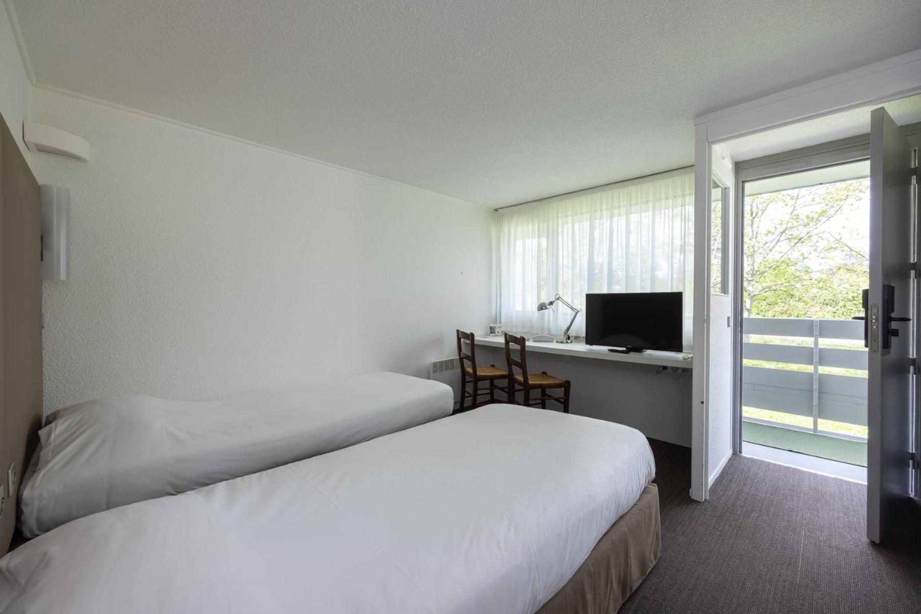 Twin Room - Photo 1