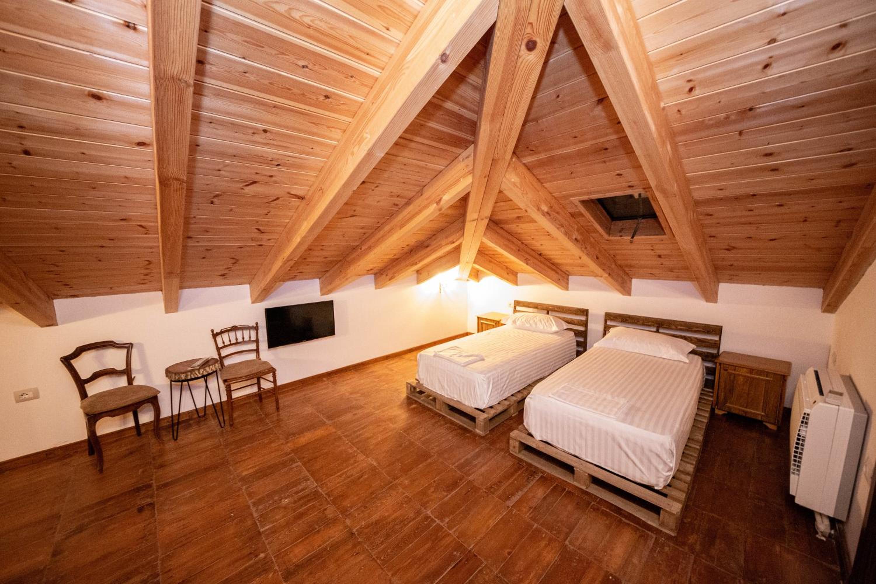 Klassisches Dreibettzimmer - Dachboden