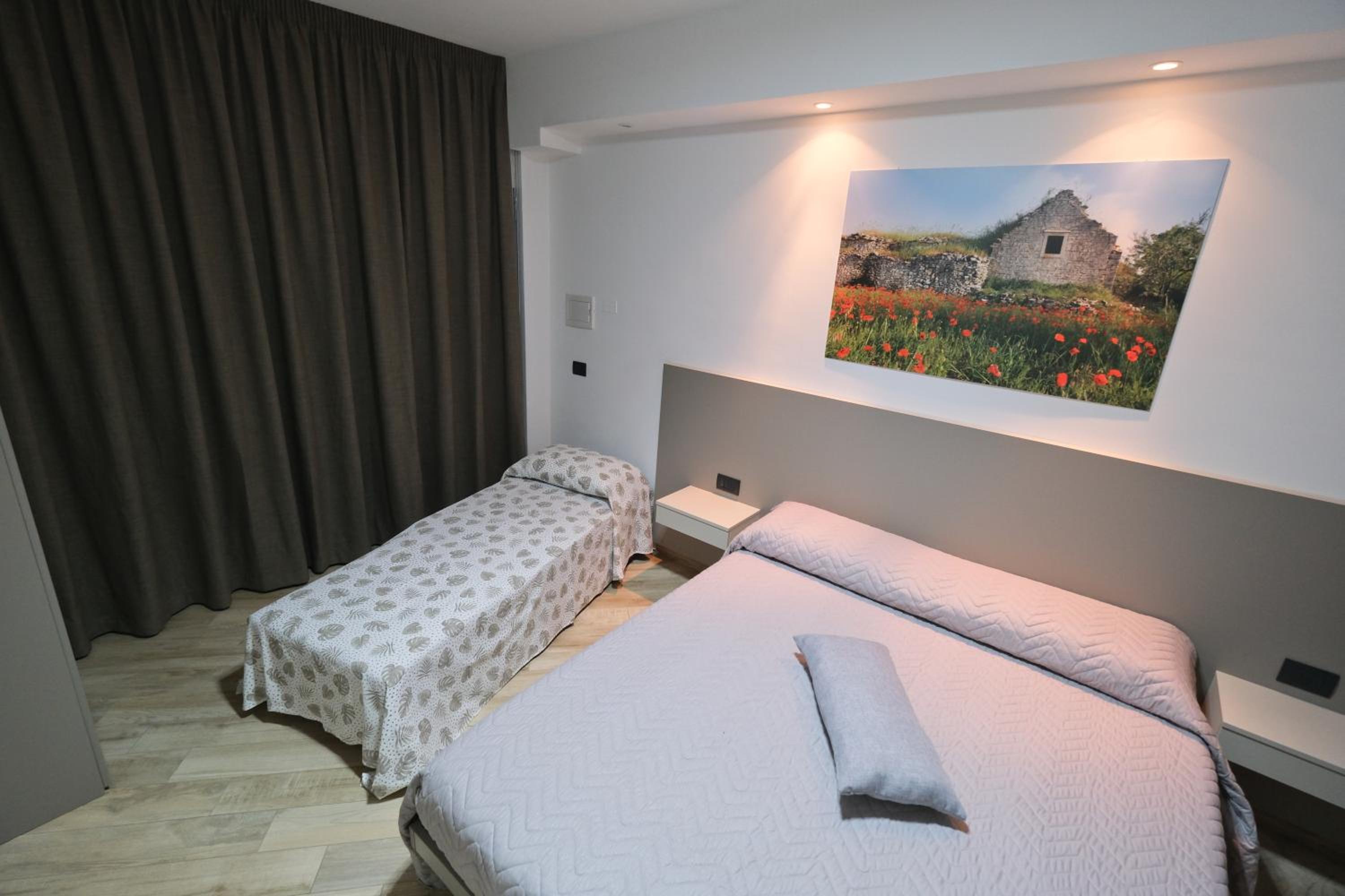 Deluxe Room (2 Adults + 1 Child)
