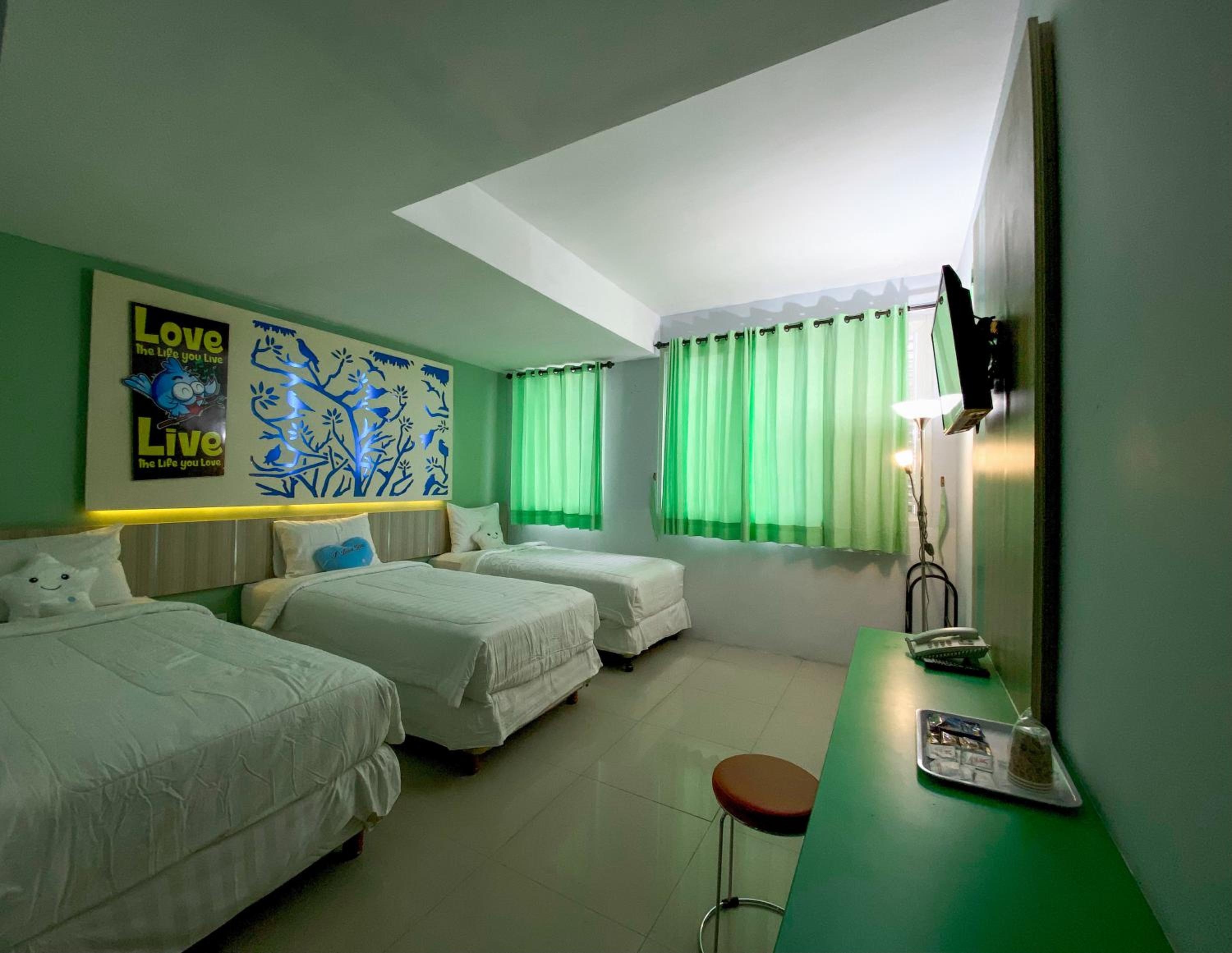 Deluxe Triple Room - Photo 1