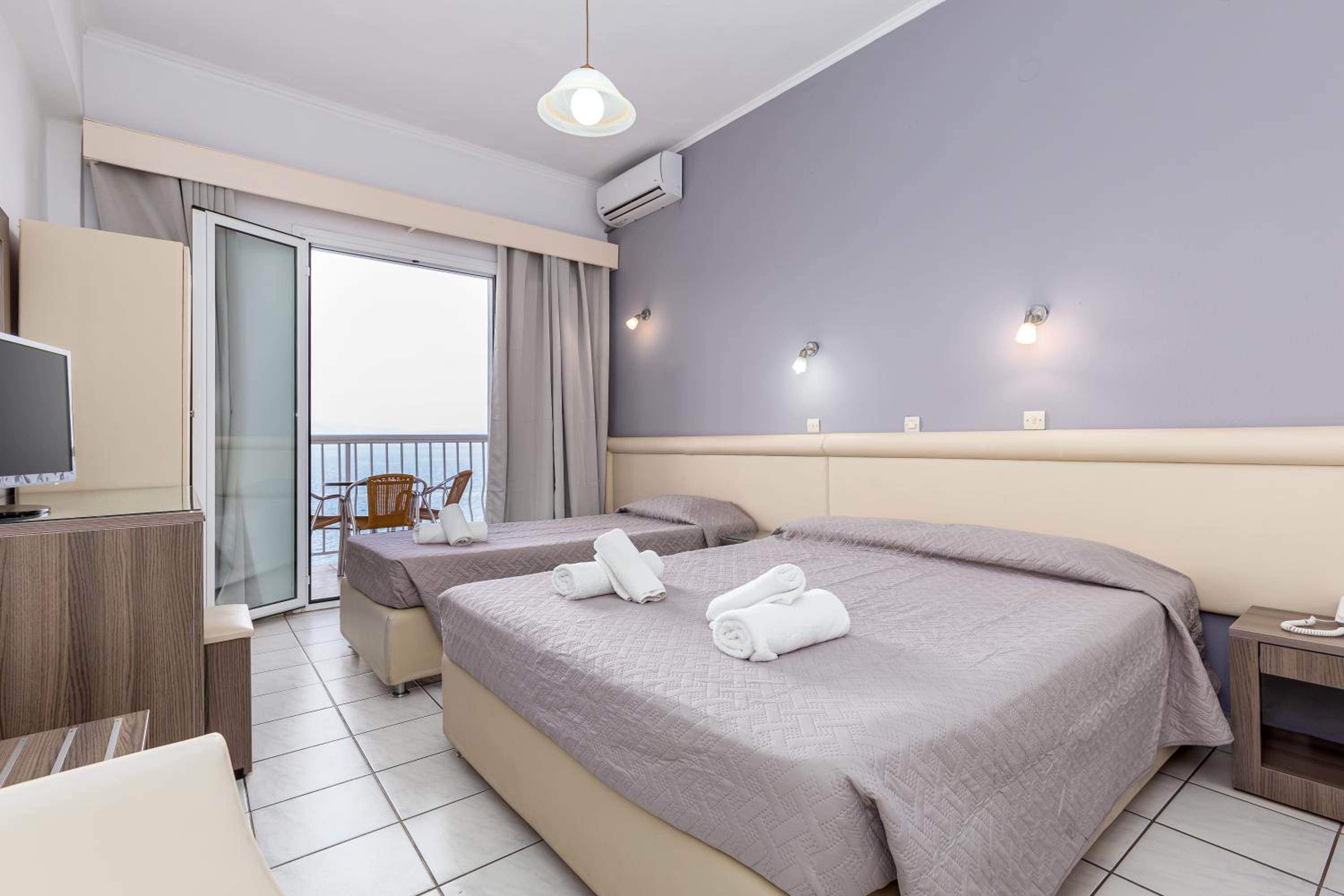 Dreibettzimmer mit Meerblick