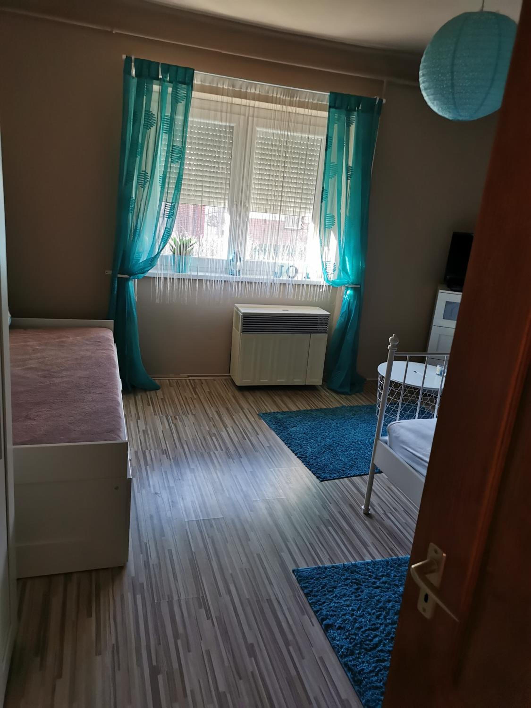 Three-Bedroom Apartment - Photo 34