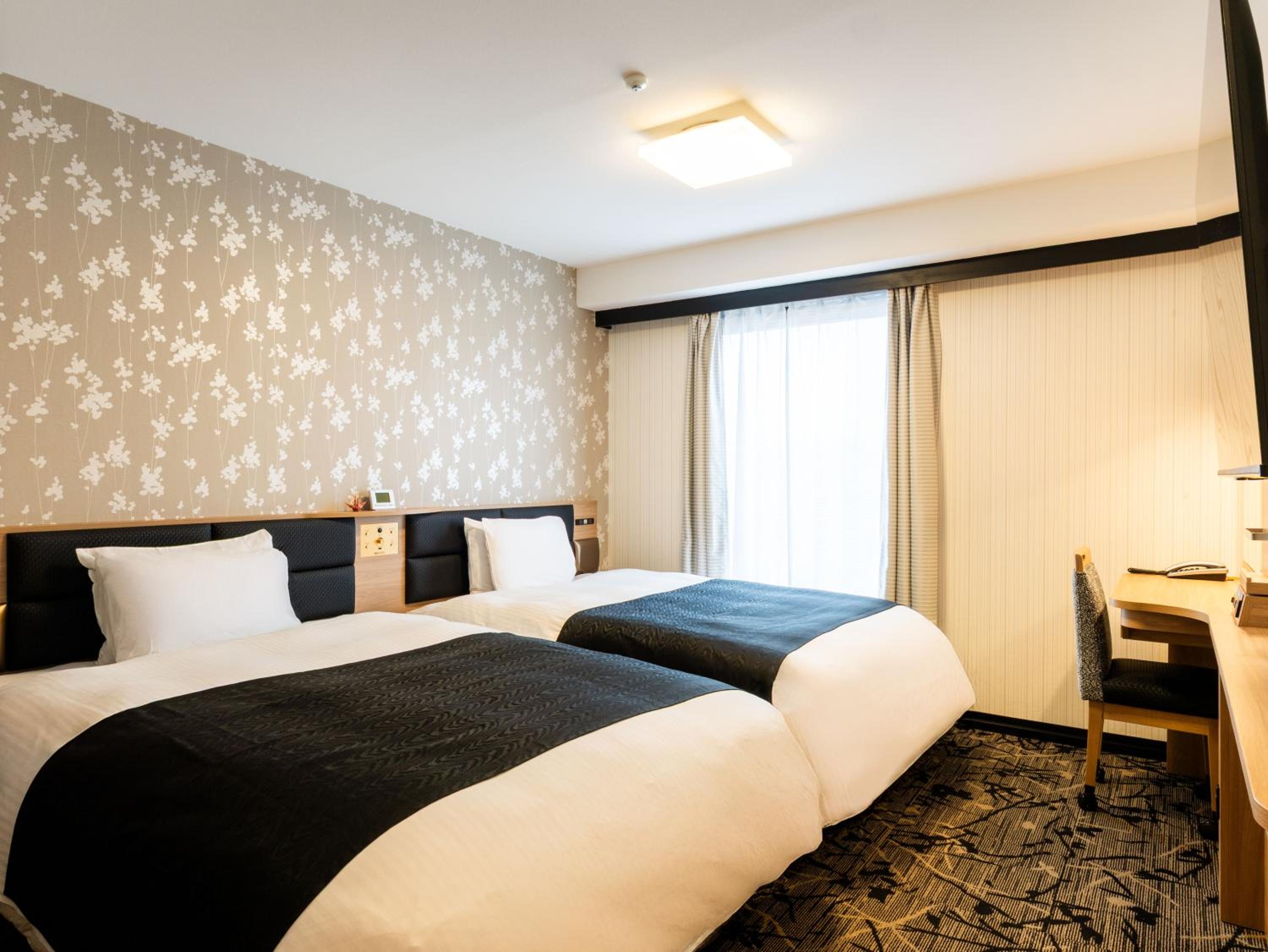 Twin Room B - Non-Smoking photo 1