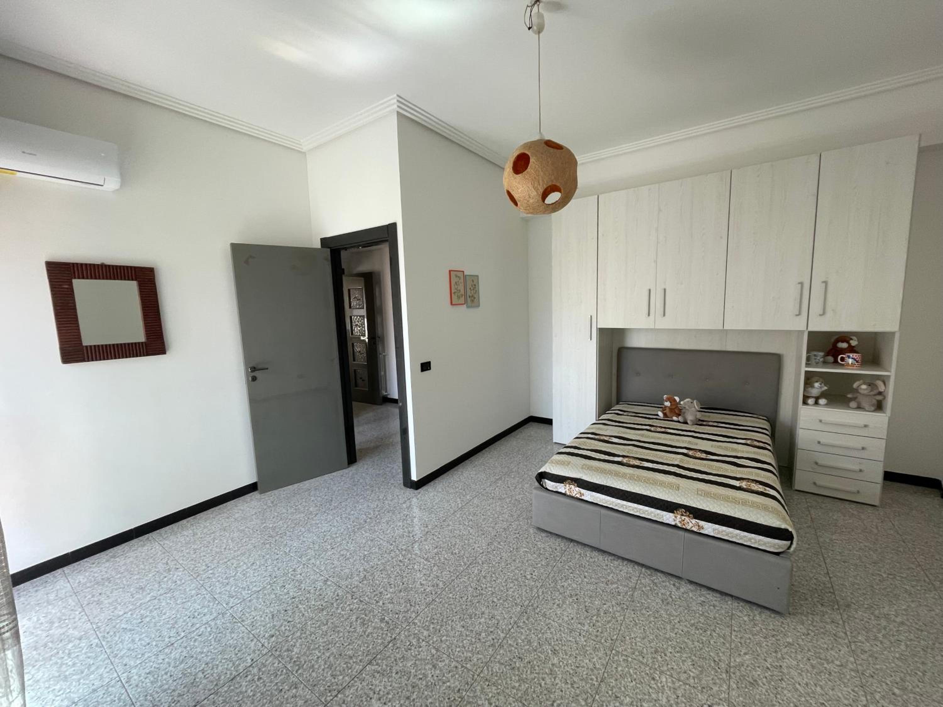 Three-Bedroom Apartment photo 2