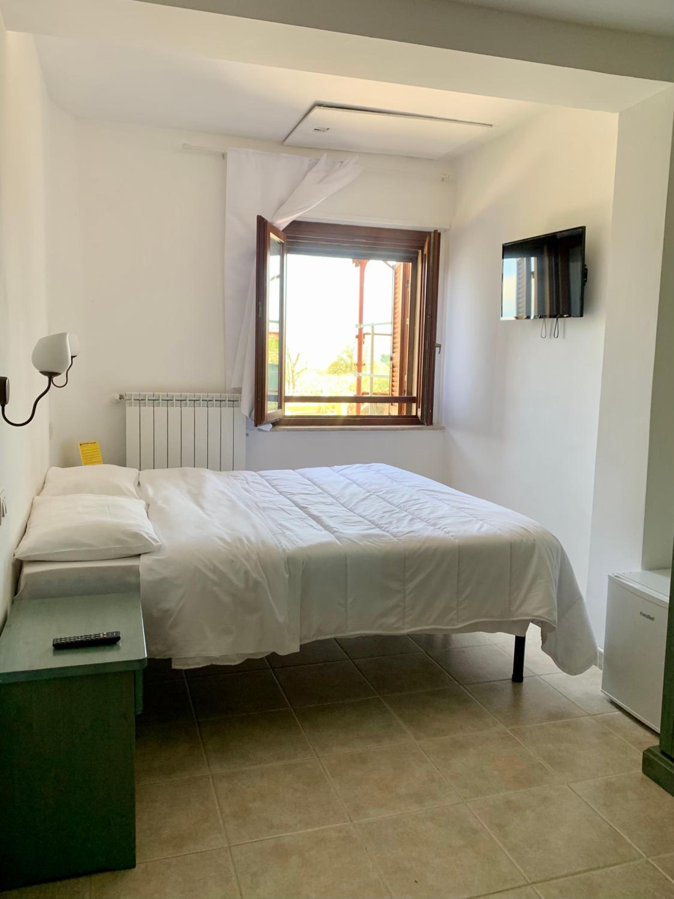 Quadruple Room with Garden View - Photo 1