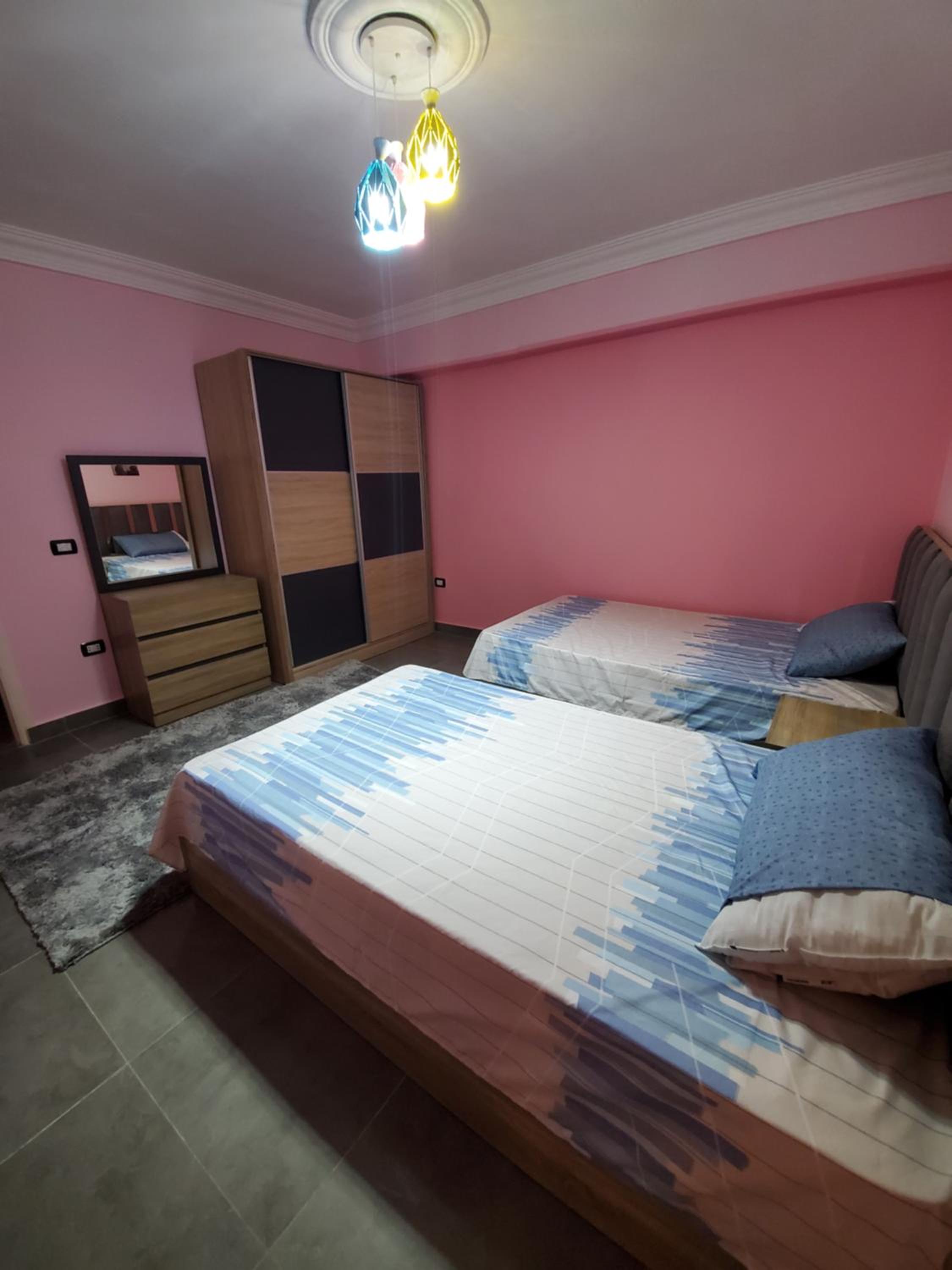 Three-Bedroom Apartment - Photo 13
