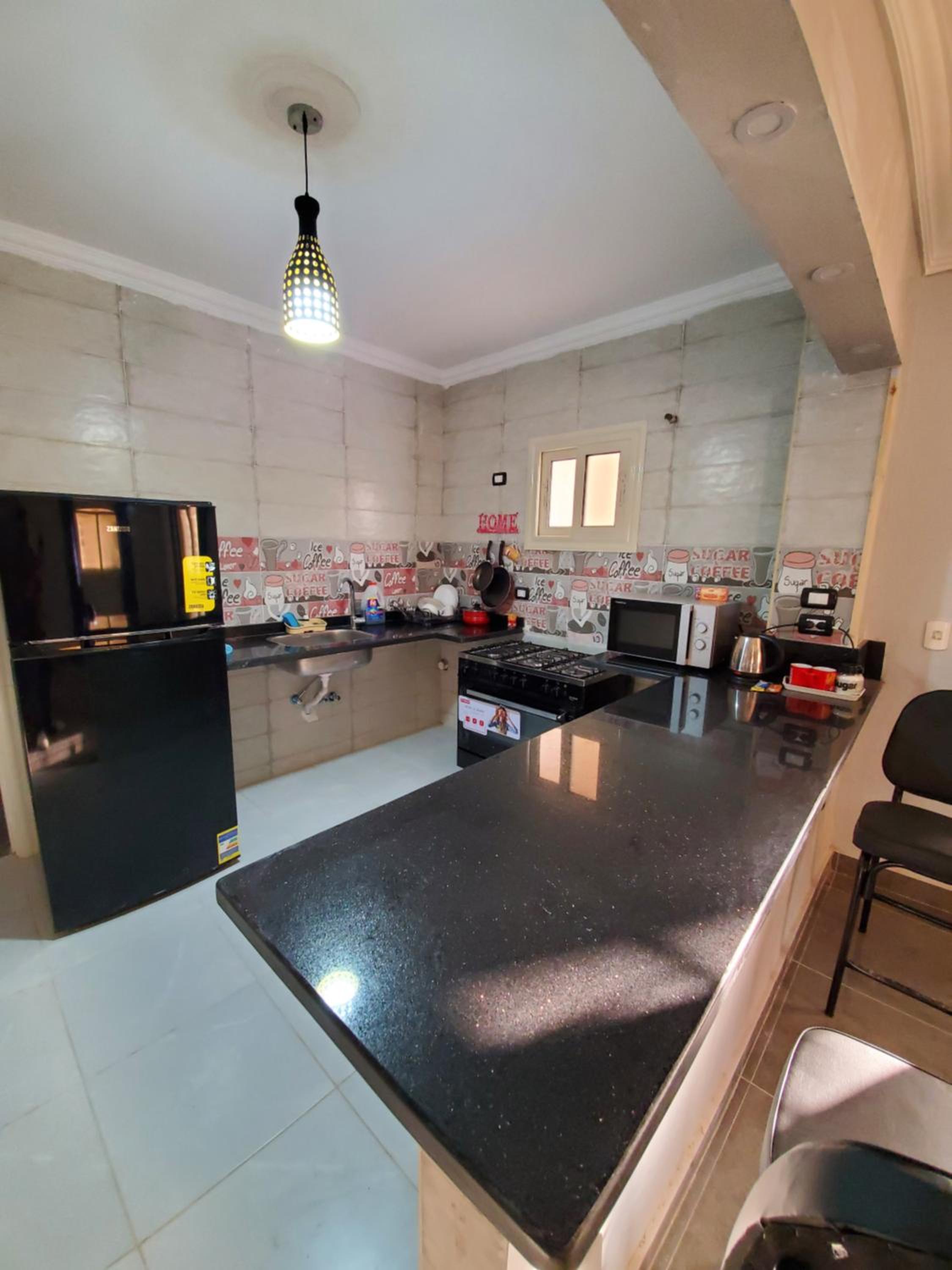 Three-Bedroom Apartment - Photo 20