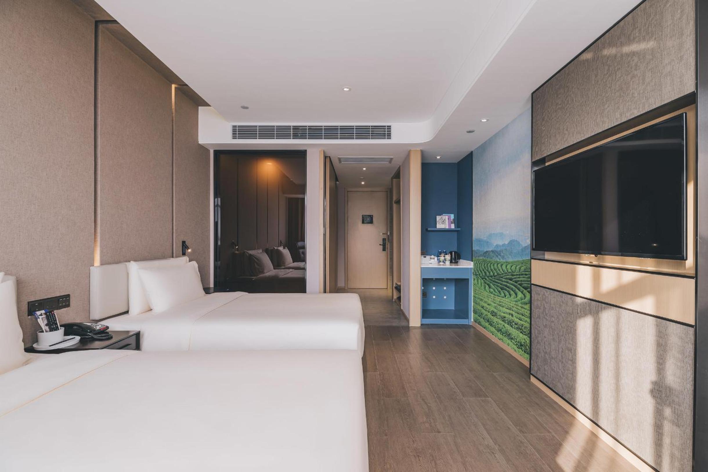 Elegant Twin Room - Photo 2