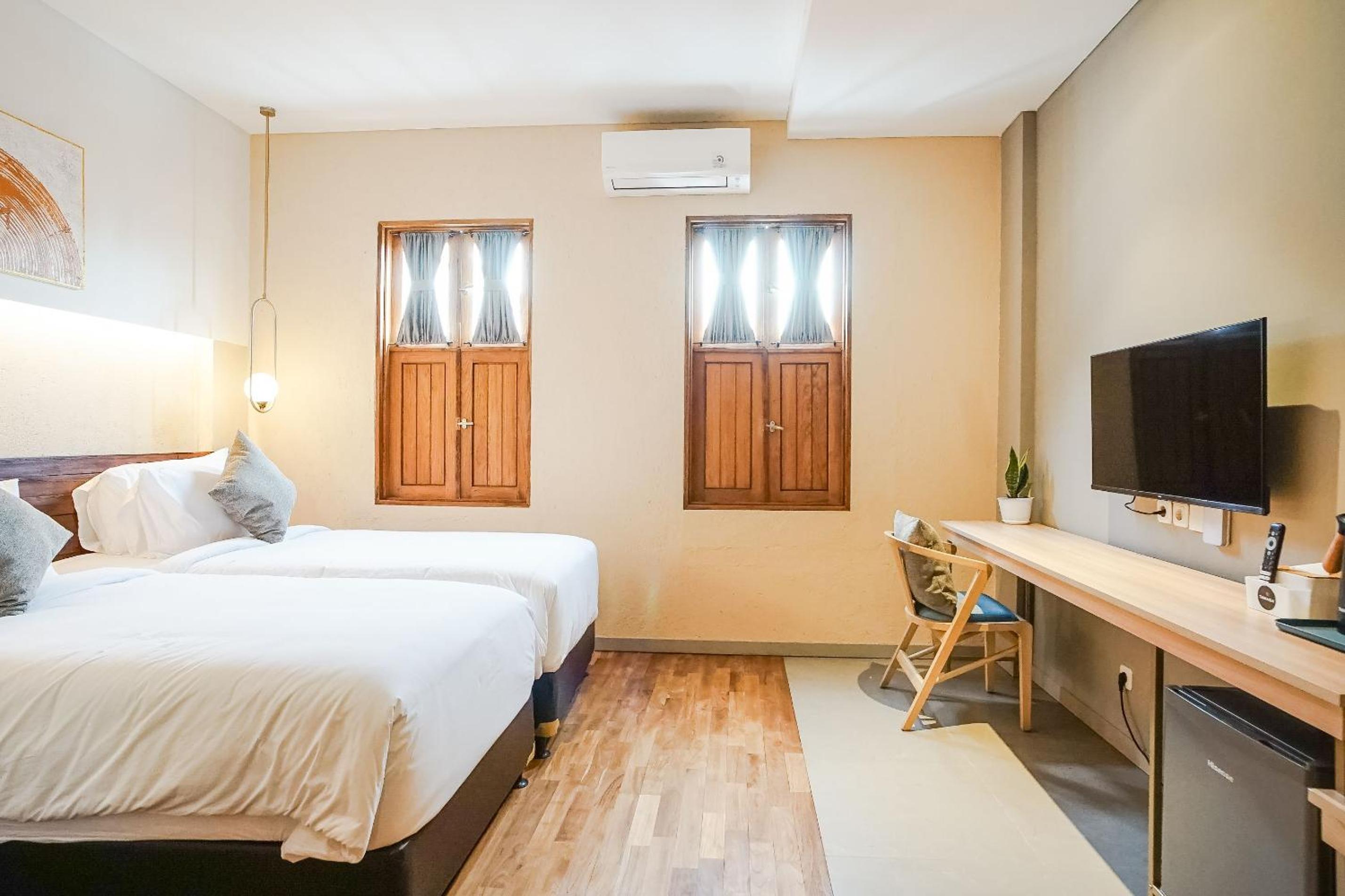Standard Twin Room - Photo 9