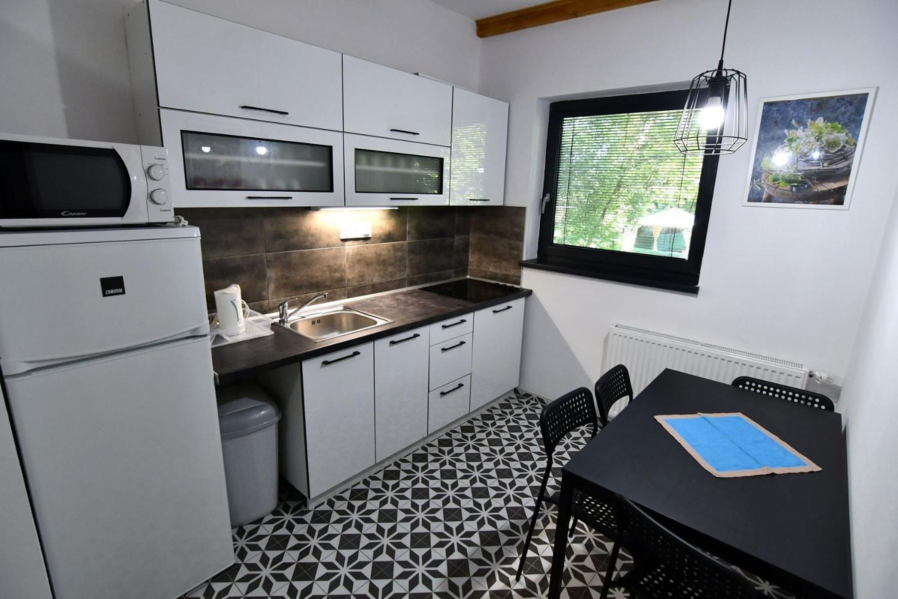 Three-Bedroom Apartment photo 3