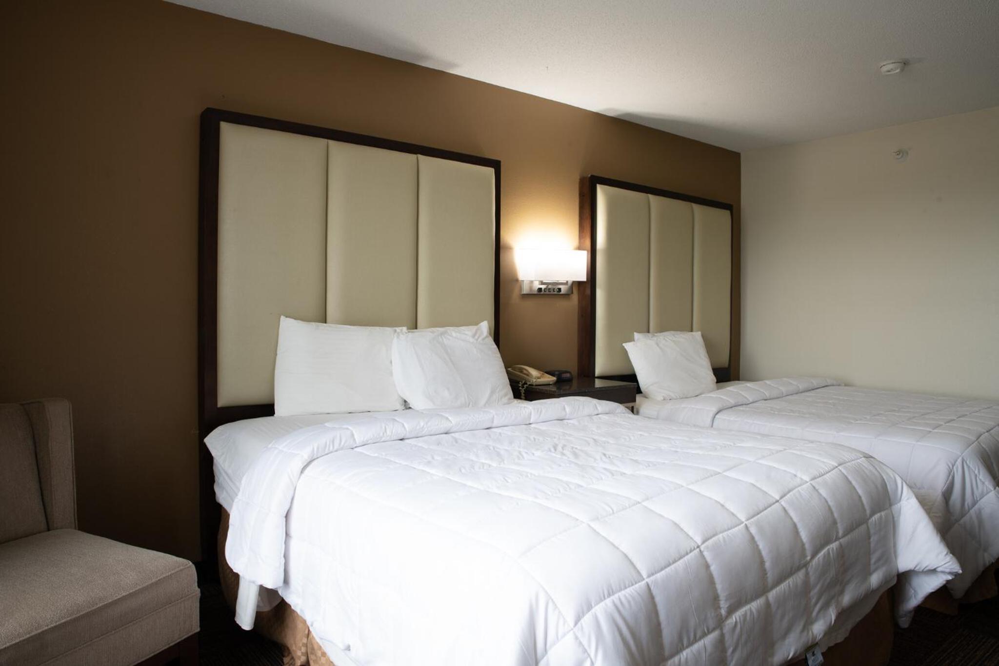 Queen Room with Two Queen Beds - Photo 1