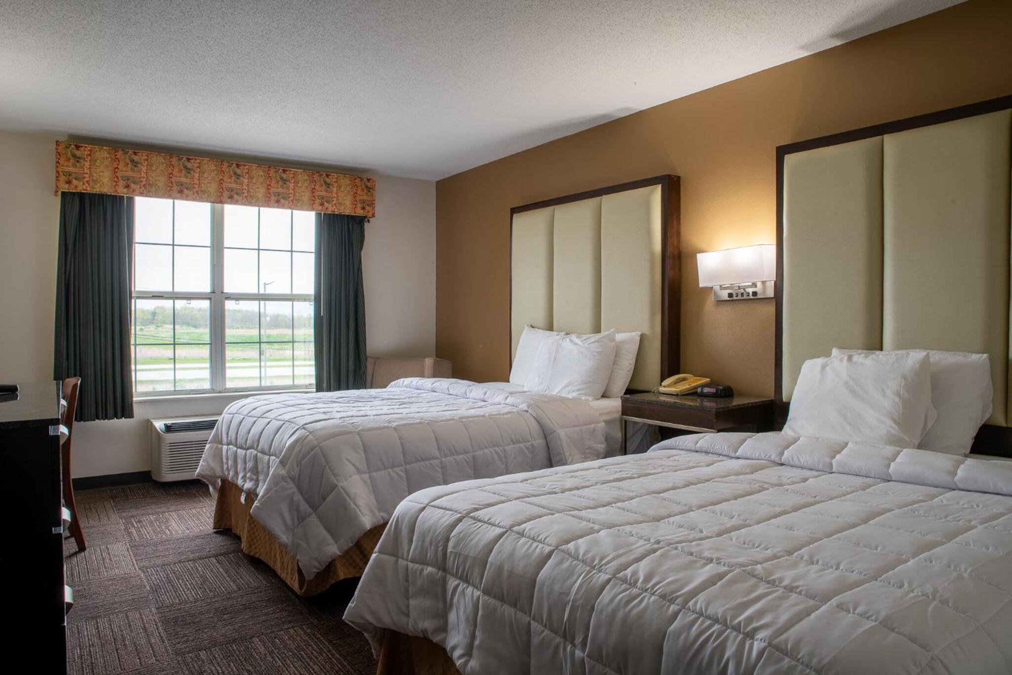 Superior Queen Room with Two Queen Beds - Photo 1