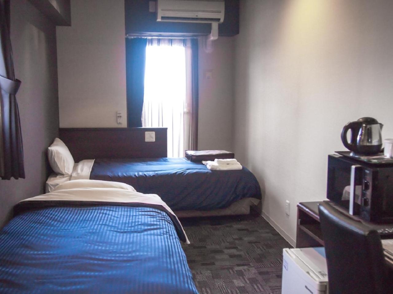 Twin Room - Non-Smoking - Photo 1