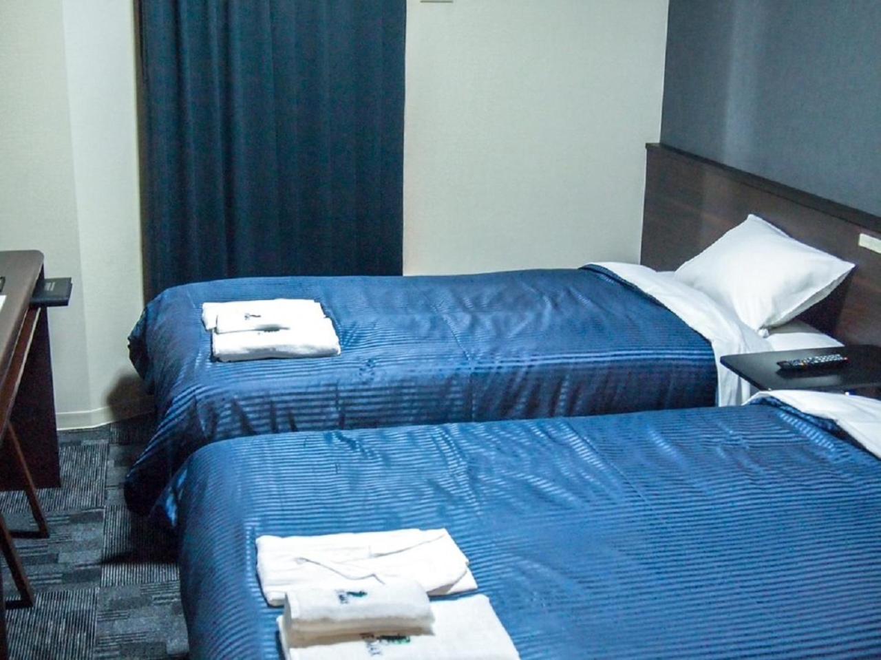 Twin Room - Non-Smoking - Photo 2