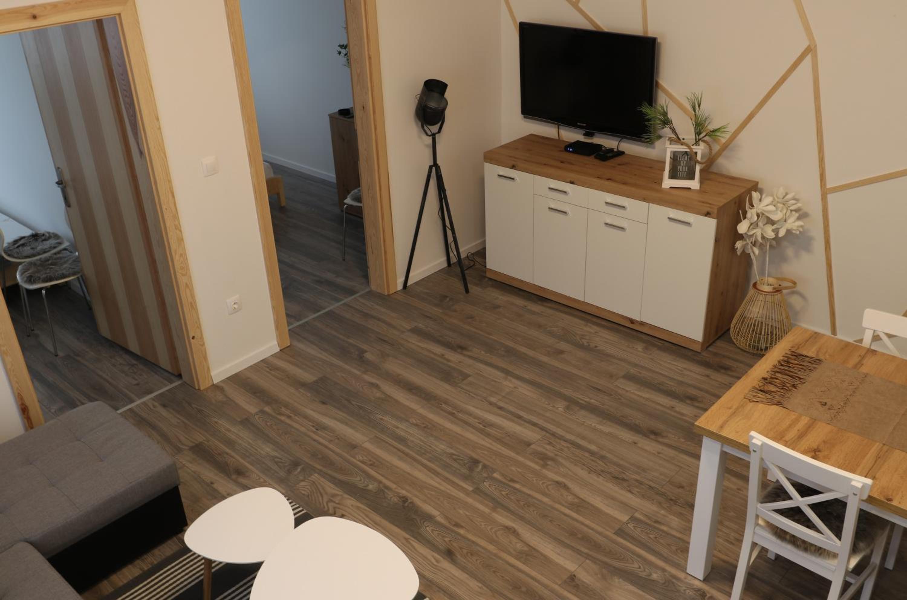 Three-Bedroom Apartment - Photo 2