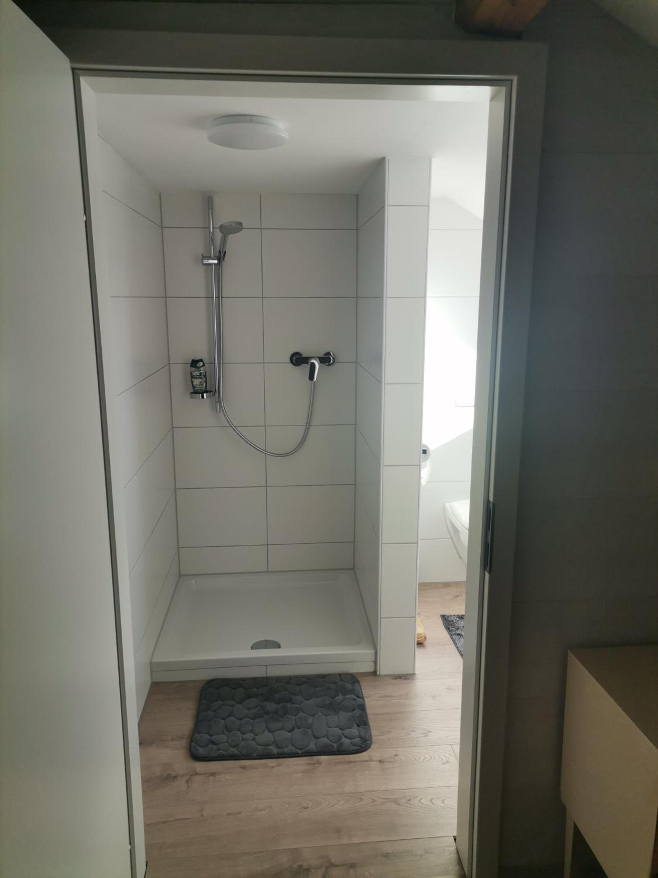 Apartment with Shower - Photo 19