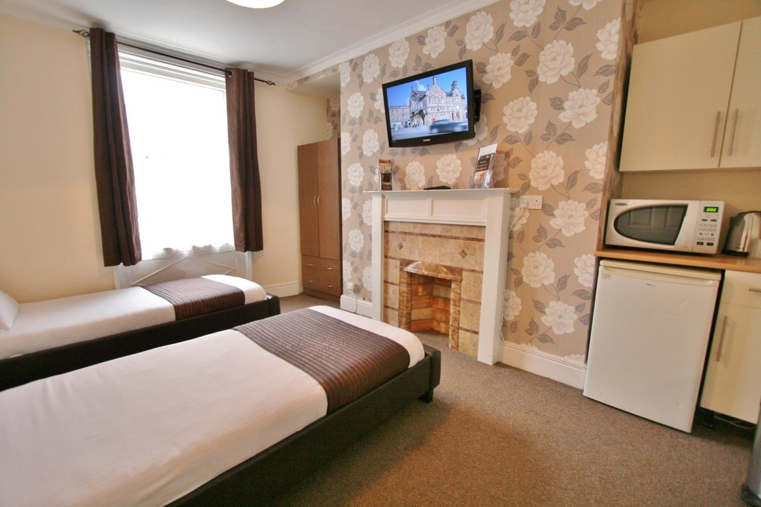 En Suite Twin Room - Photo 1