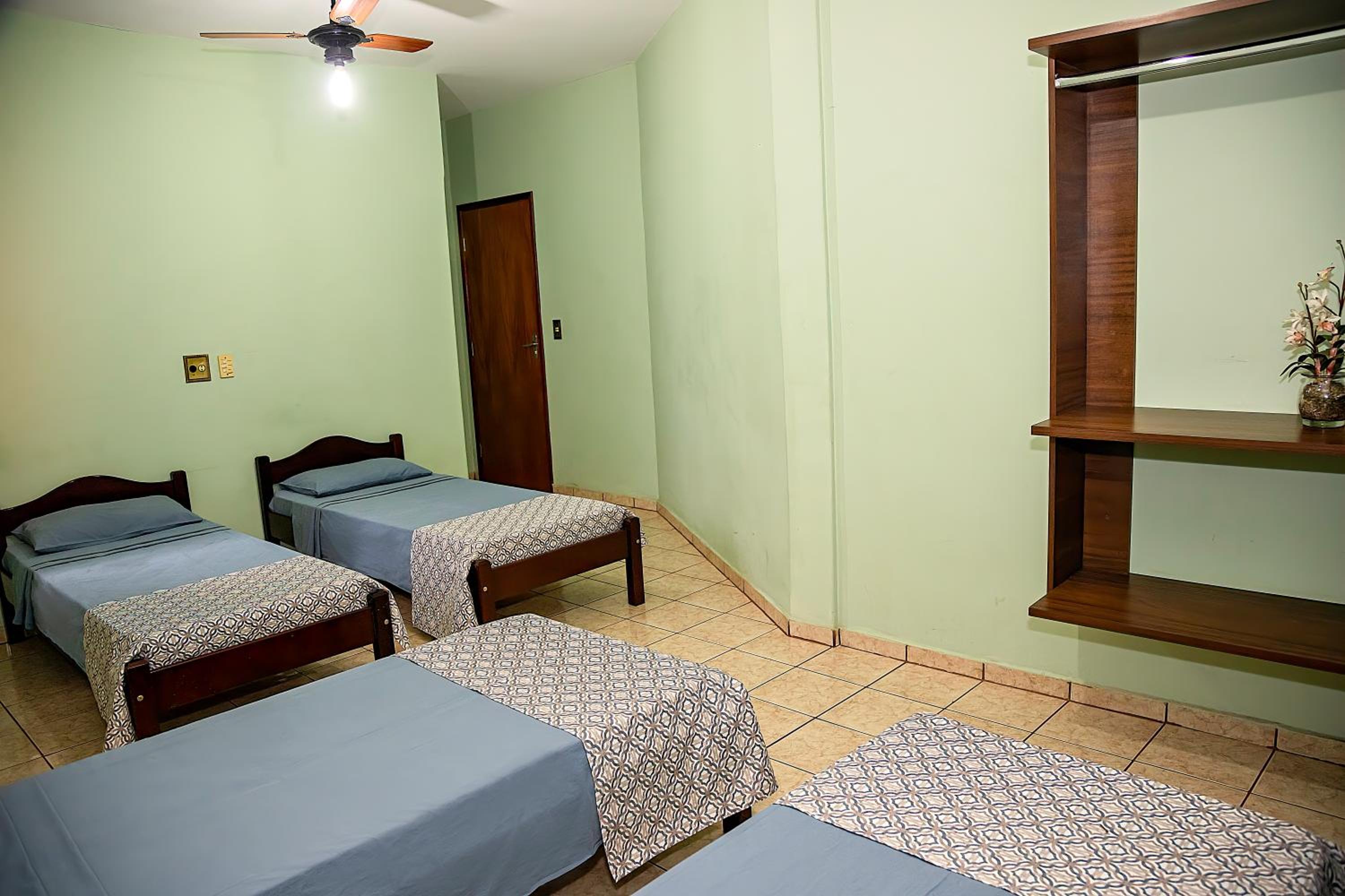 Quadruple Room with Balcony and Ceiling Fan photo 3